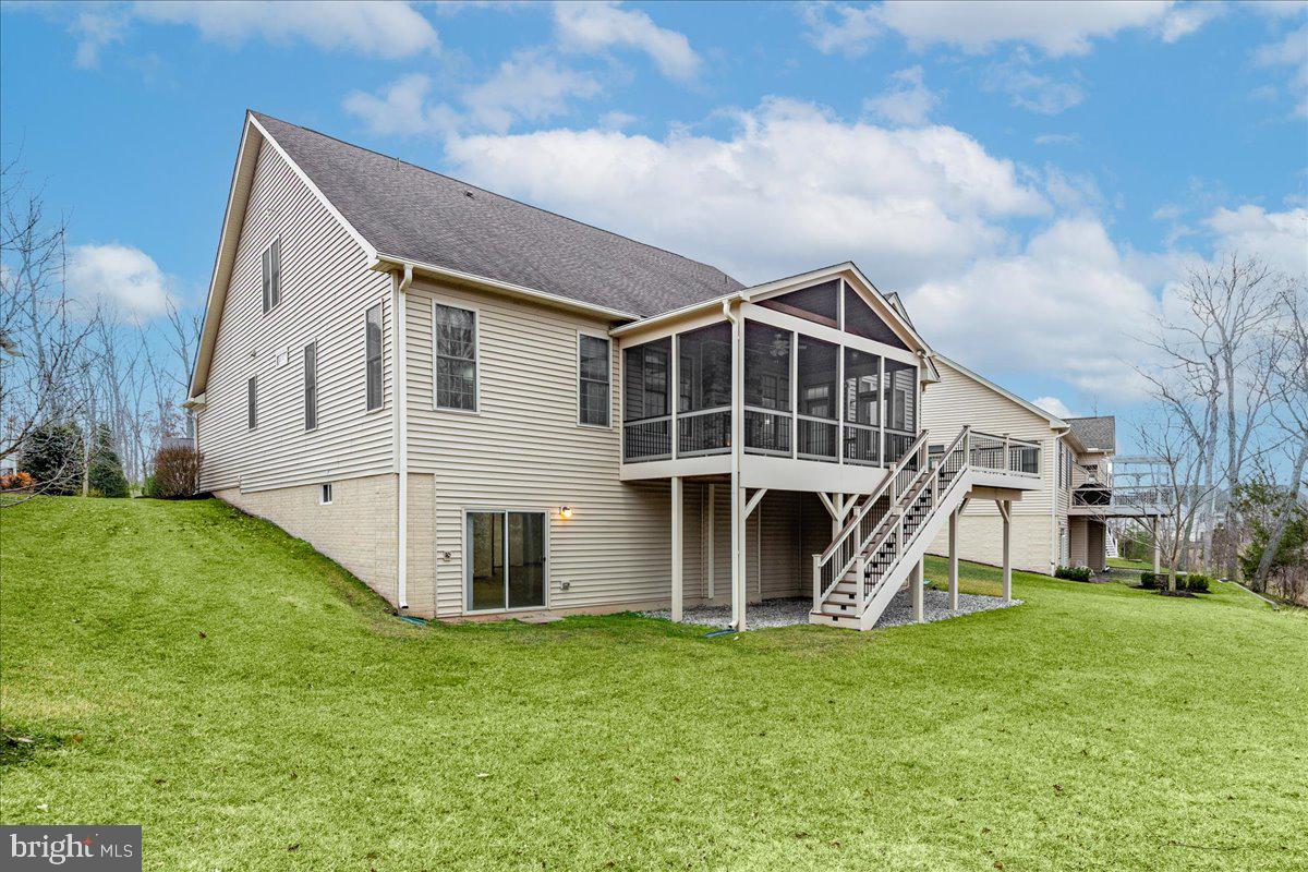 13712 Long Ridge Drive Gainesville, VA 20155 - Photo 49 of 62 a view of a house with a yard