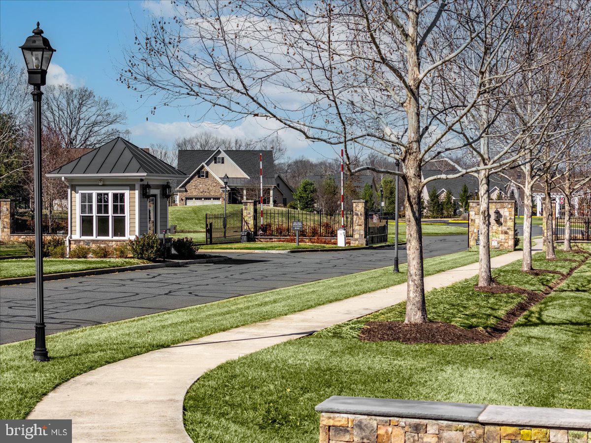 13712 Long Ridge Drive Gainesville, VA 20155 - Photo 53 of 62 a front view of a house with a yard