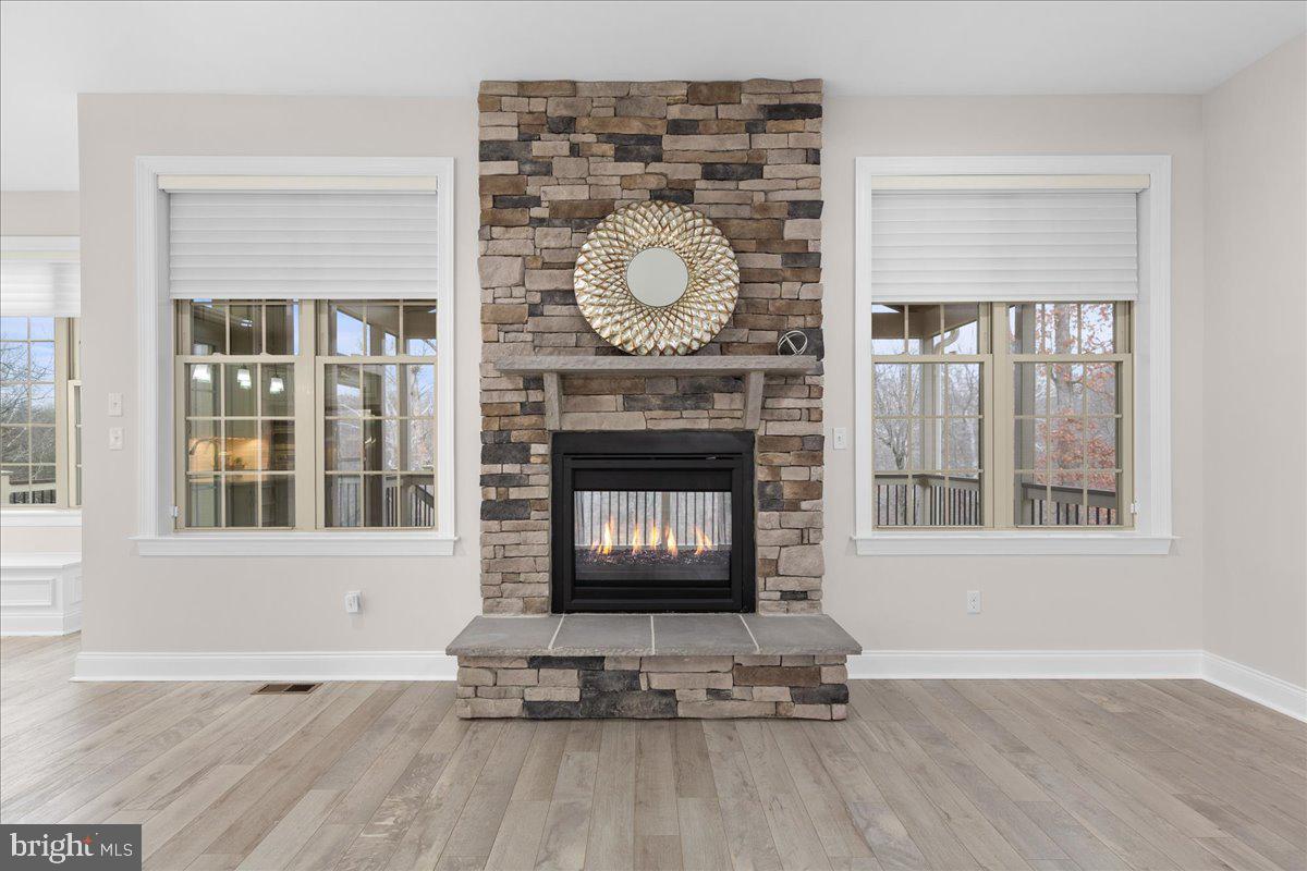 13712 Long Ridge Drive Gainesville, VA 20155 - Photo 6 of 62 a living room with fireplace furniture and a window
