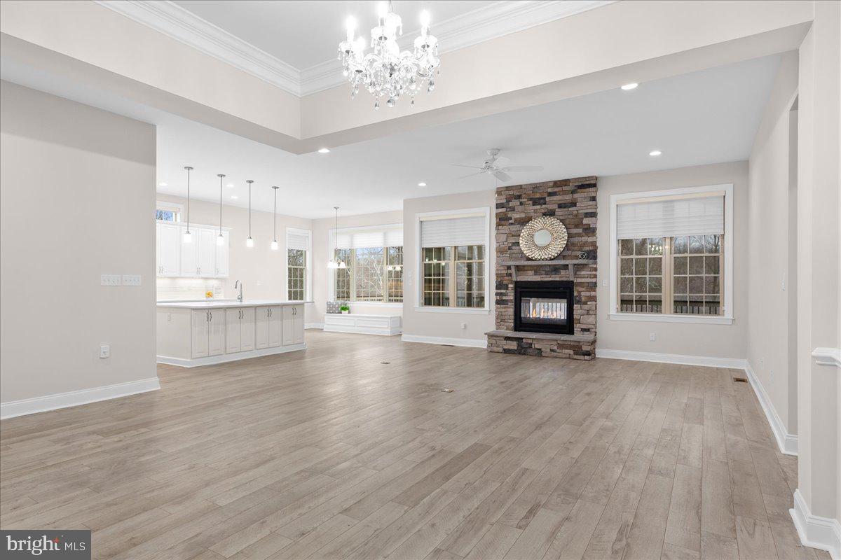 13712 Long Ridge Drive Gainesville, VA 20155 - Photo 7 of 62 a view of an empty room with wooden floor and a window