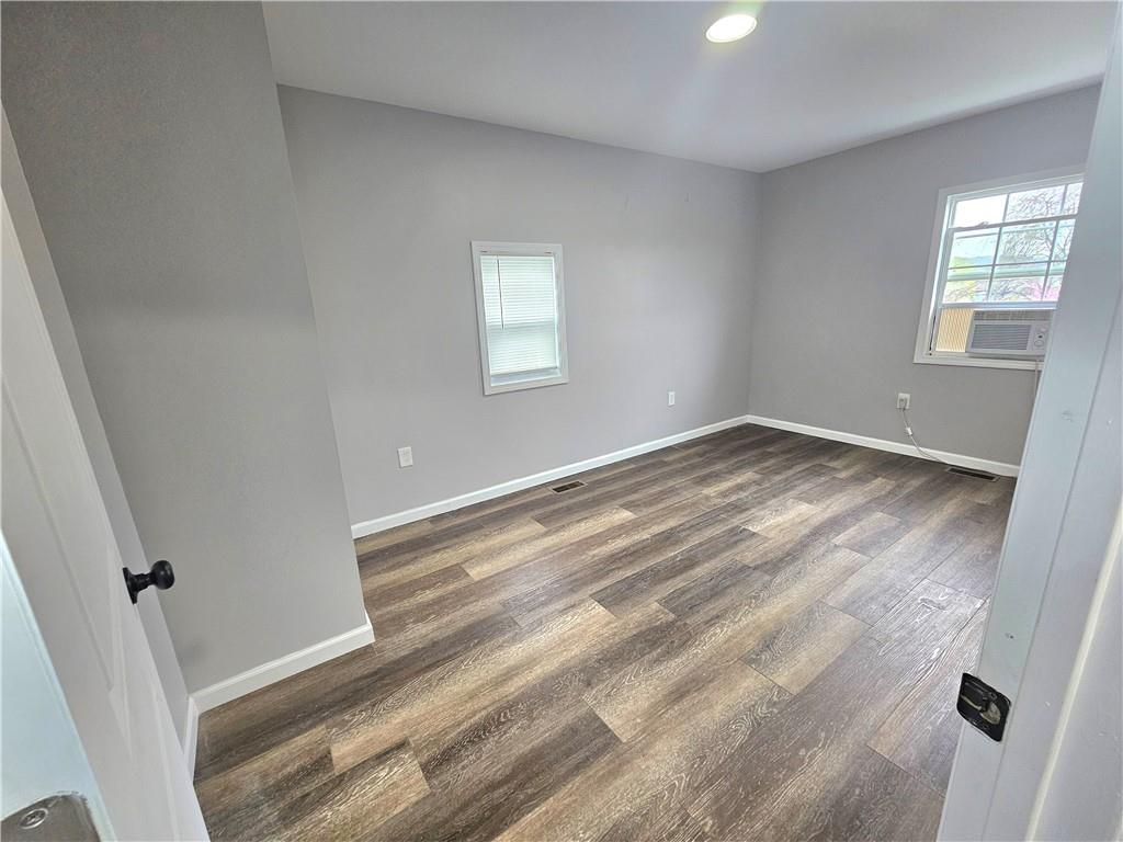 418 Short Street Donora, PA 15033 - Photo 15 of 22 a view of a room with wooden floor and window