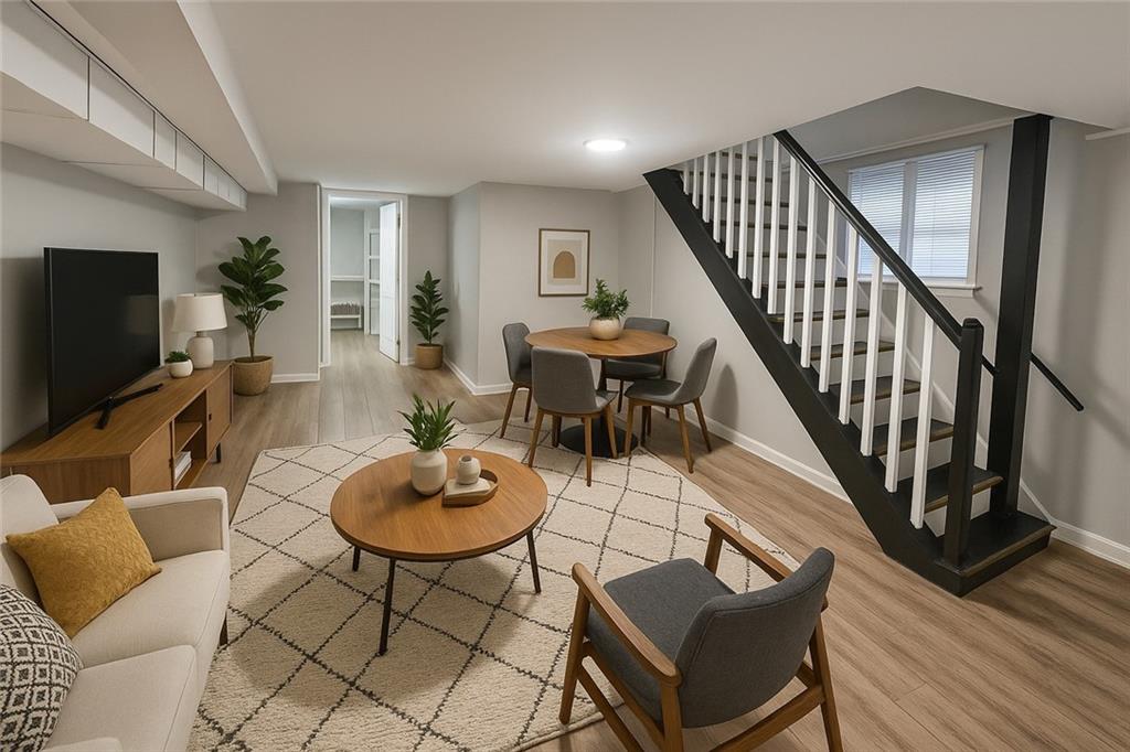 418 Short Street Donora, PA 15033 - Photo 19 of 22 a living room with furniture a flat screen tv and a table