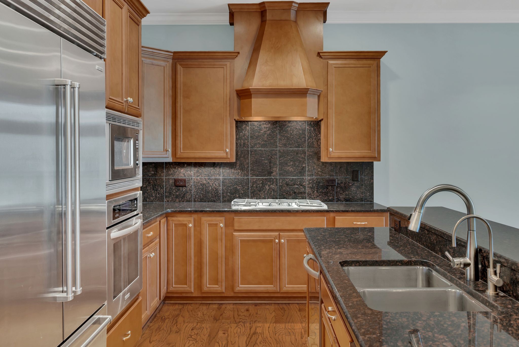 2411 Crestmoor Road, Unit 104 Nashville, TN 37215 - Photo 11 of 32 a kitchen with granite countertop a sink and stainless steel appliances