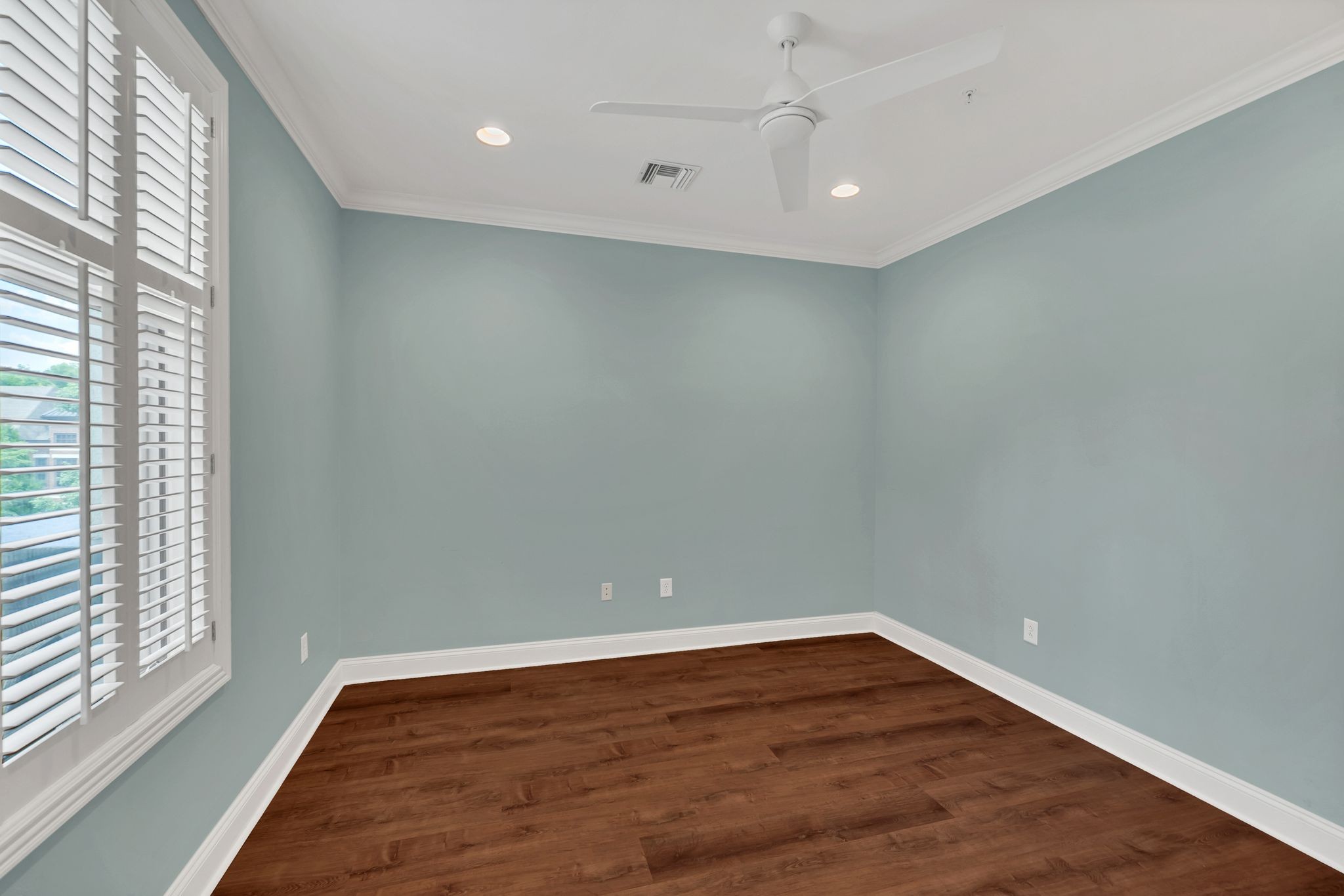 2411 Crestmoor Road, Unit 104 Nashville, TN 37215 - Photo 15 of 32 a view of an empty room with wooden floor and a window