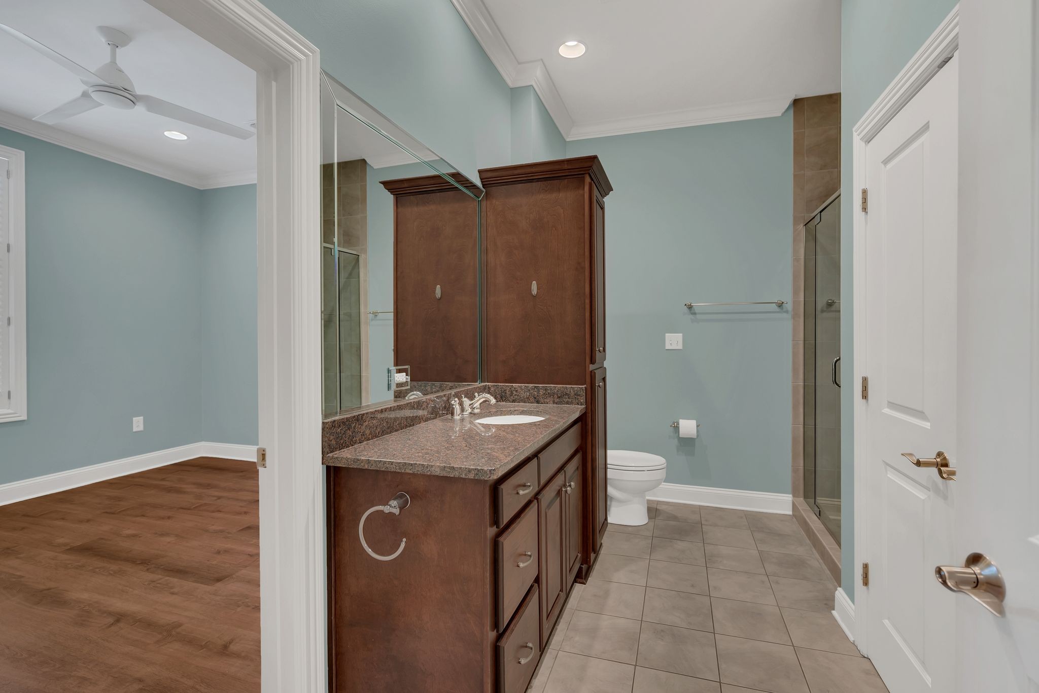 2411 Crestmoor Road, Unit 104 Nashville, TN 37215 - Photo 16 of 32 a spacious bathroom with a granite countertop sink a toilet and shower