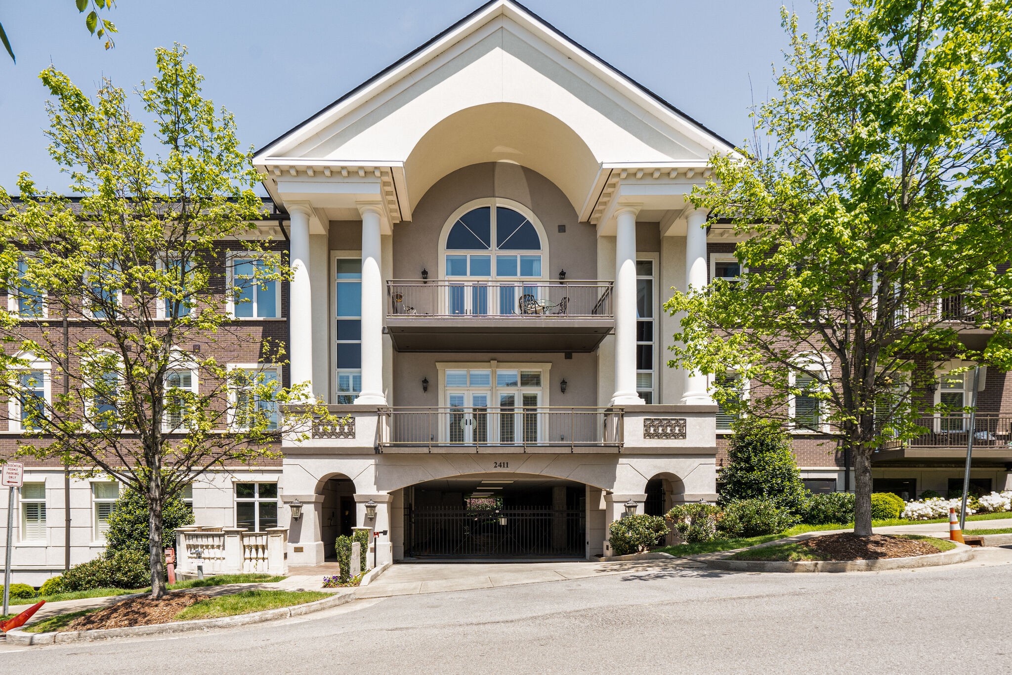 2411 Crestmoor Road, Unit 104 Nashville, TN 37215 - Photo 2 of 32 a view of a building with a balcony