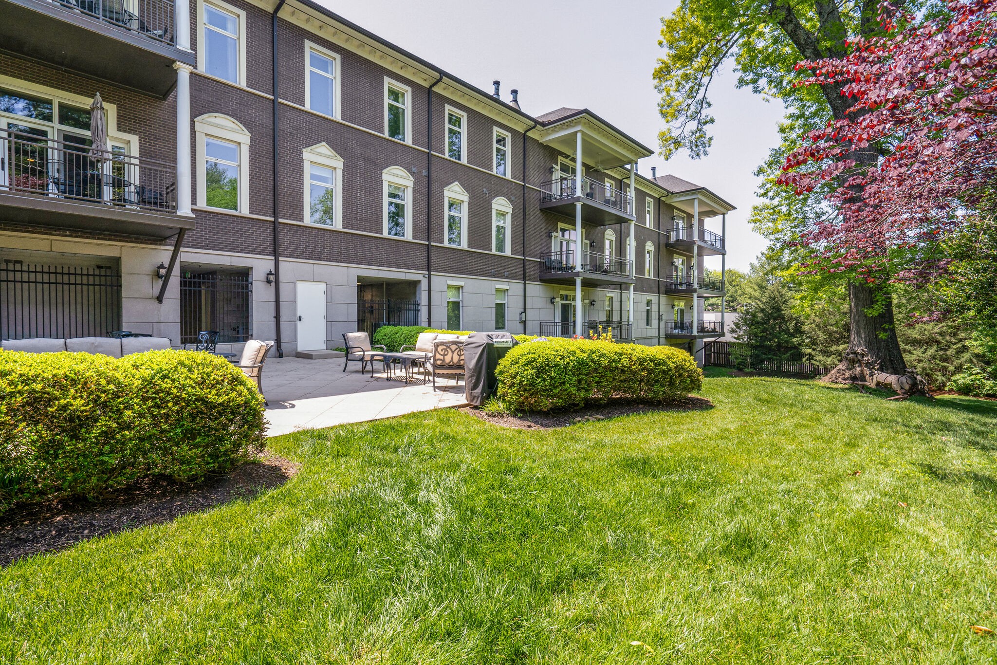 2411 Crestmoor Road, Unit 104 Nashville, TN 37215 - Photo 32 of 32 a view of a house with a yard