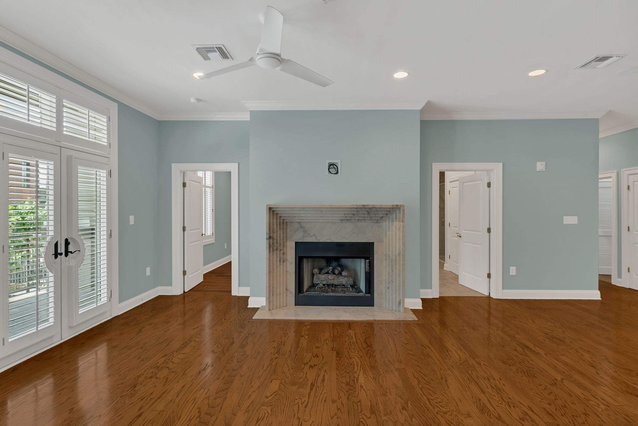 2411 Crestmoor Road, Unit 104 Nashville, TN 37215 - Photo 6 of 32 a view of a livingroom with a fireplace wooden floor and window