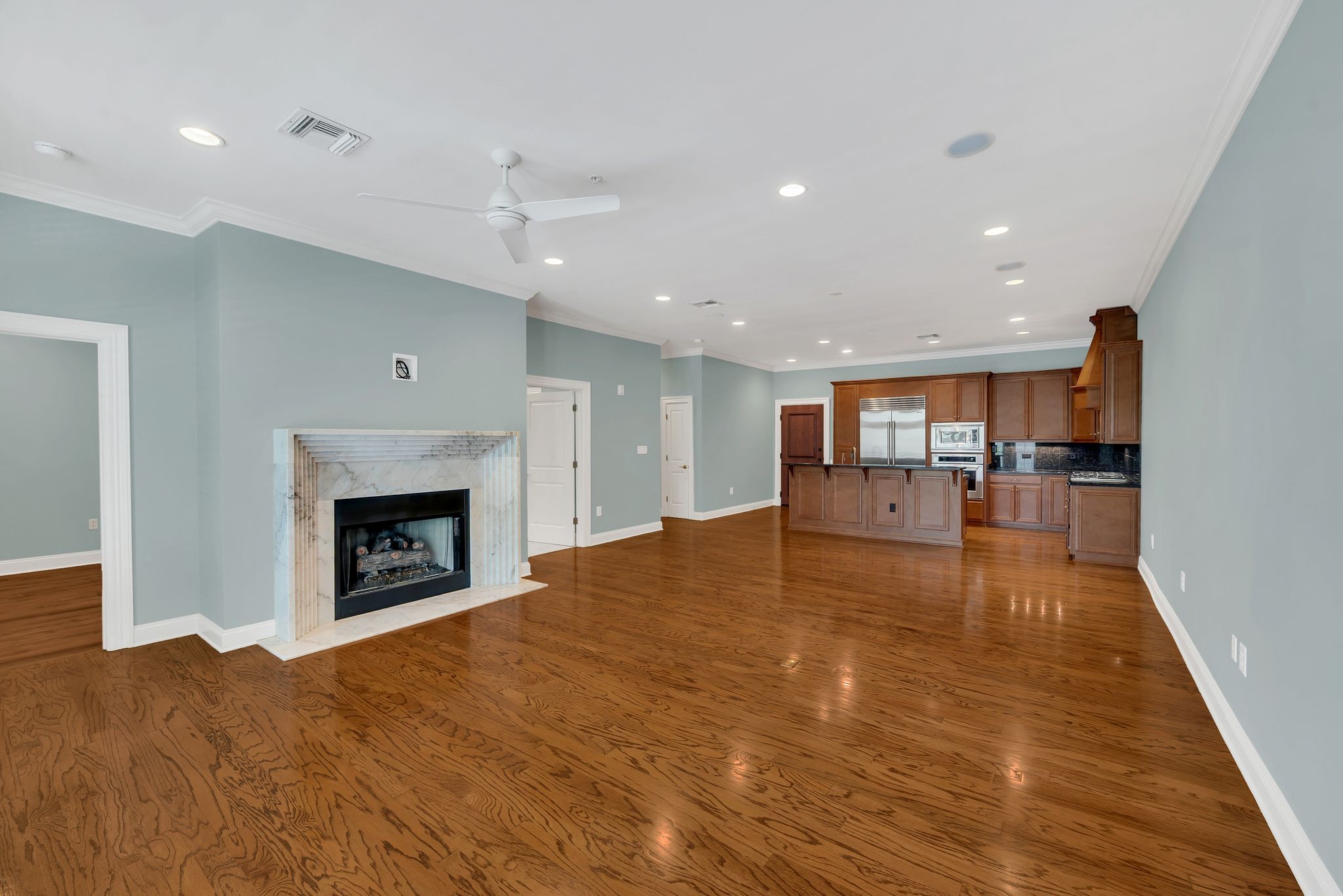 2411 Crestmoor Road, Unit 104 Nashville, TN 37215 - Photo 7 of 32 a view of kitchen and a fireplace