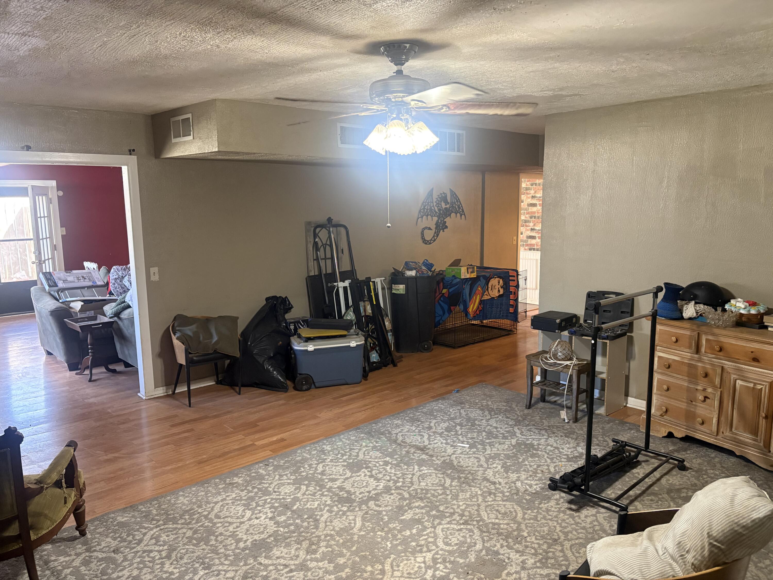 2009 46th Street Lubbock, TX 79412 - Photo 8 of 41 a view of a room with gym equipment