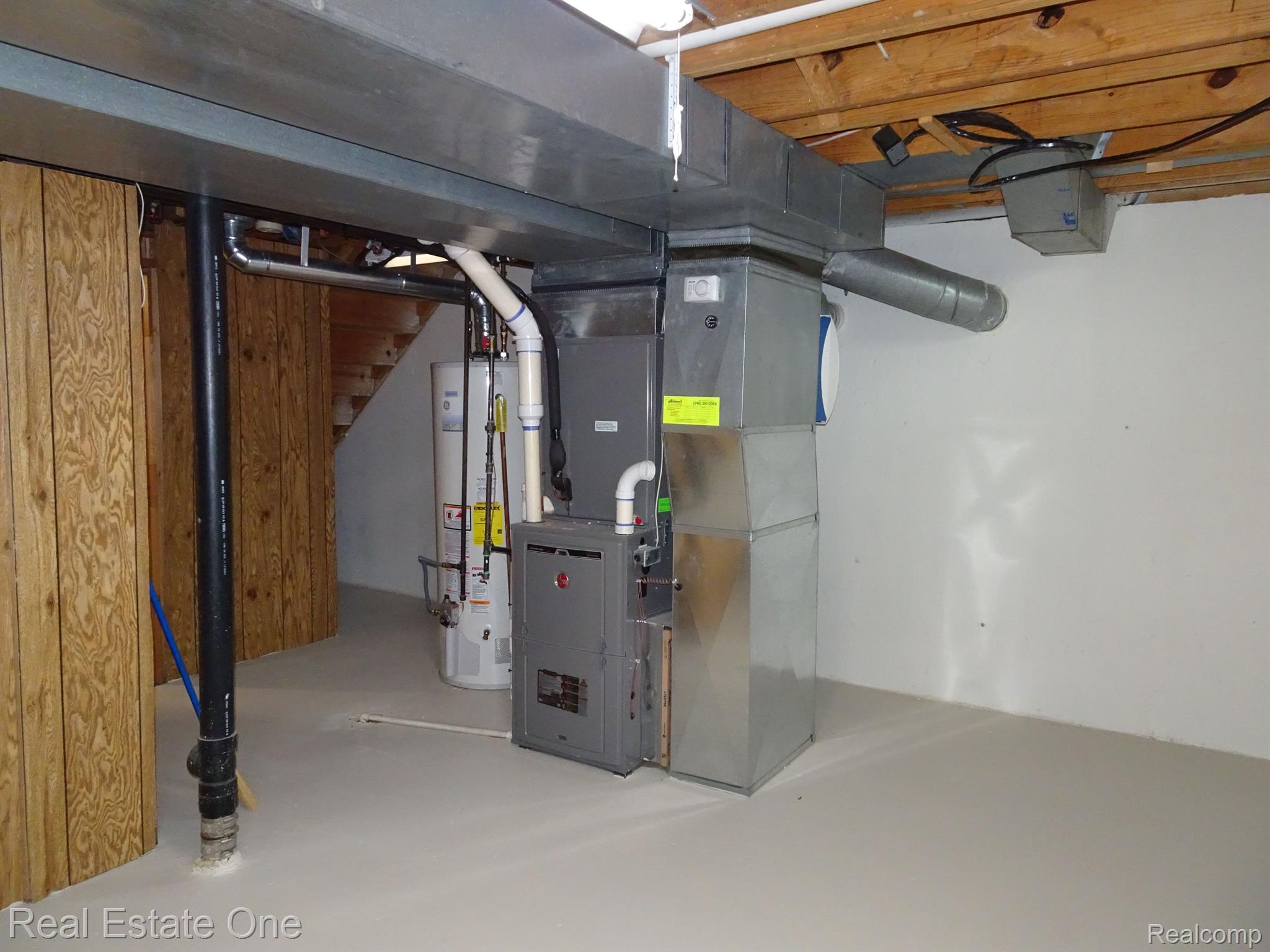 901 Downhill Lane Rochester, MI 48307 - Photo 22 of 23 Furnace/Hot water heater in basement