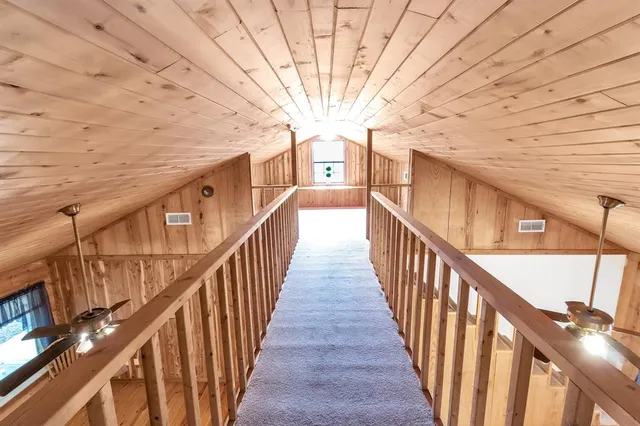 a view of a staircase with wooden floor and stairs
