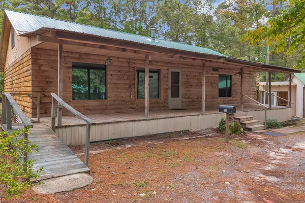 a view of house with outdoor space