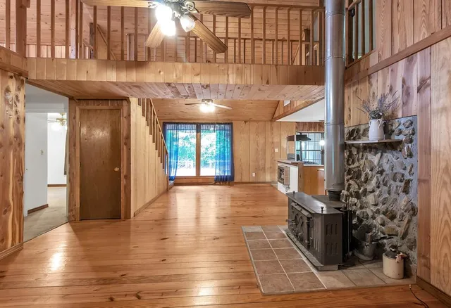 a view of an entryway with a rug
