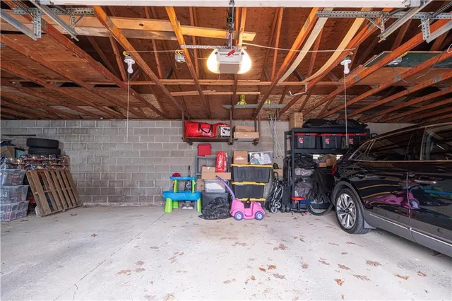 a view of parking garage with cars