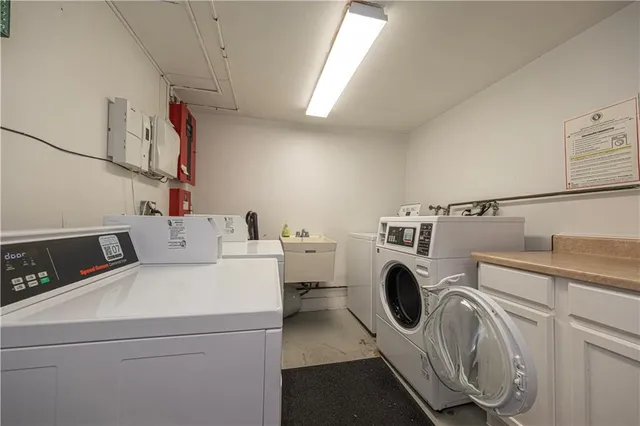 a utility room with dryer and washer