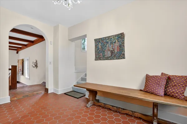 a view of a balcony with furniture