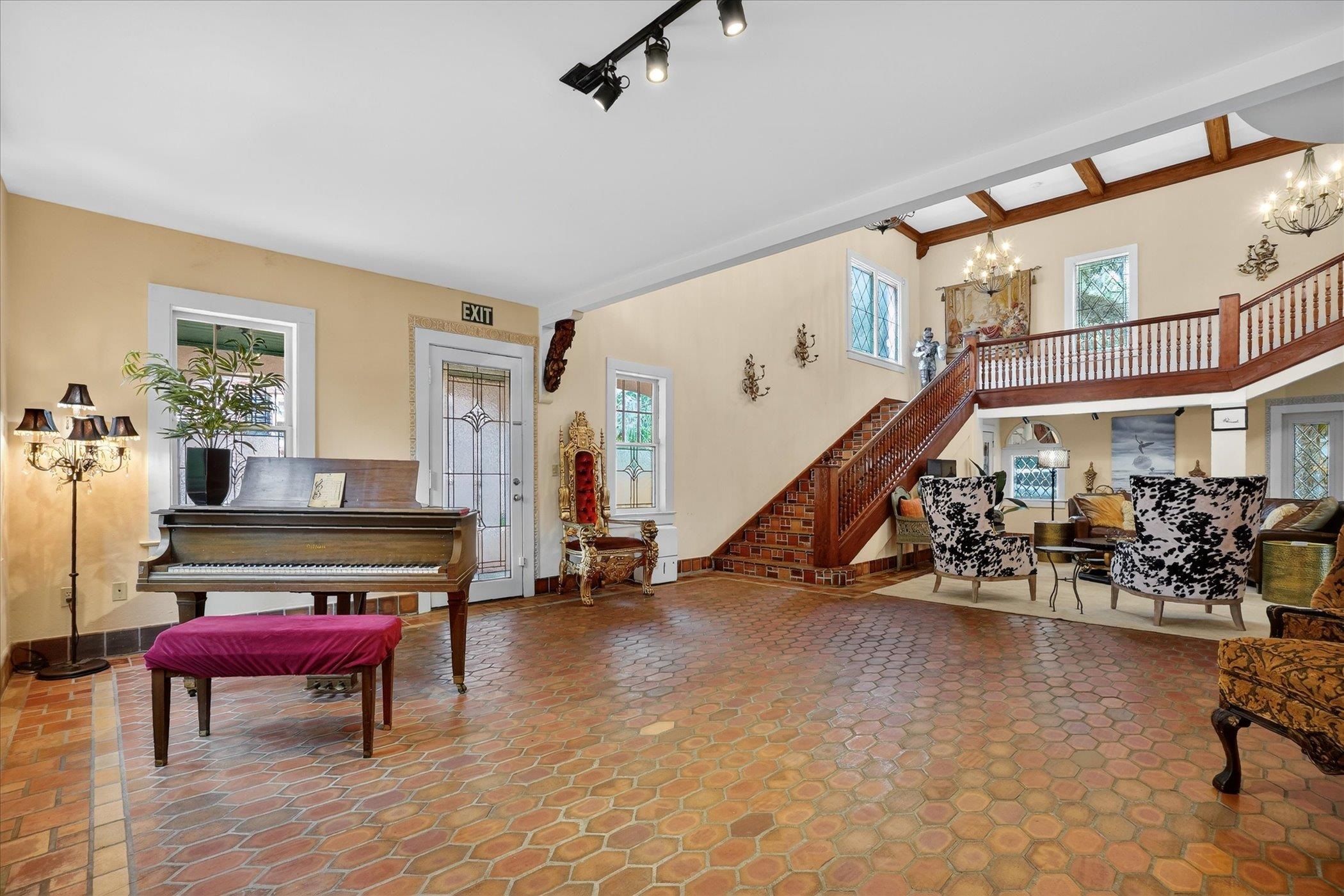 16 May Street St. Augustine, FL 32084 - Photo 13 of 85 a living room with furniture a rug and a potted plant