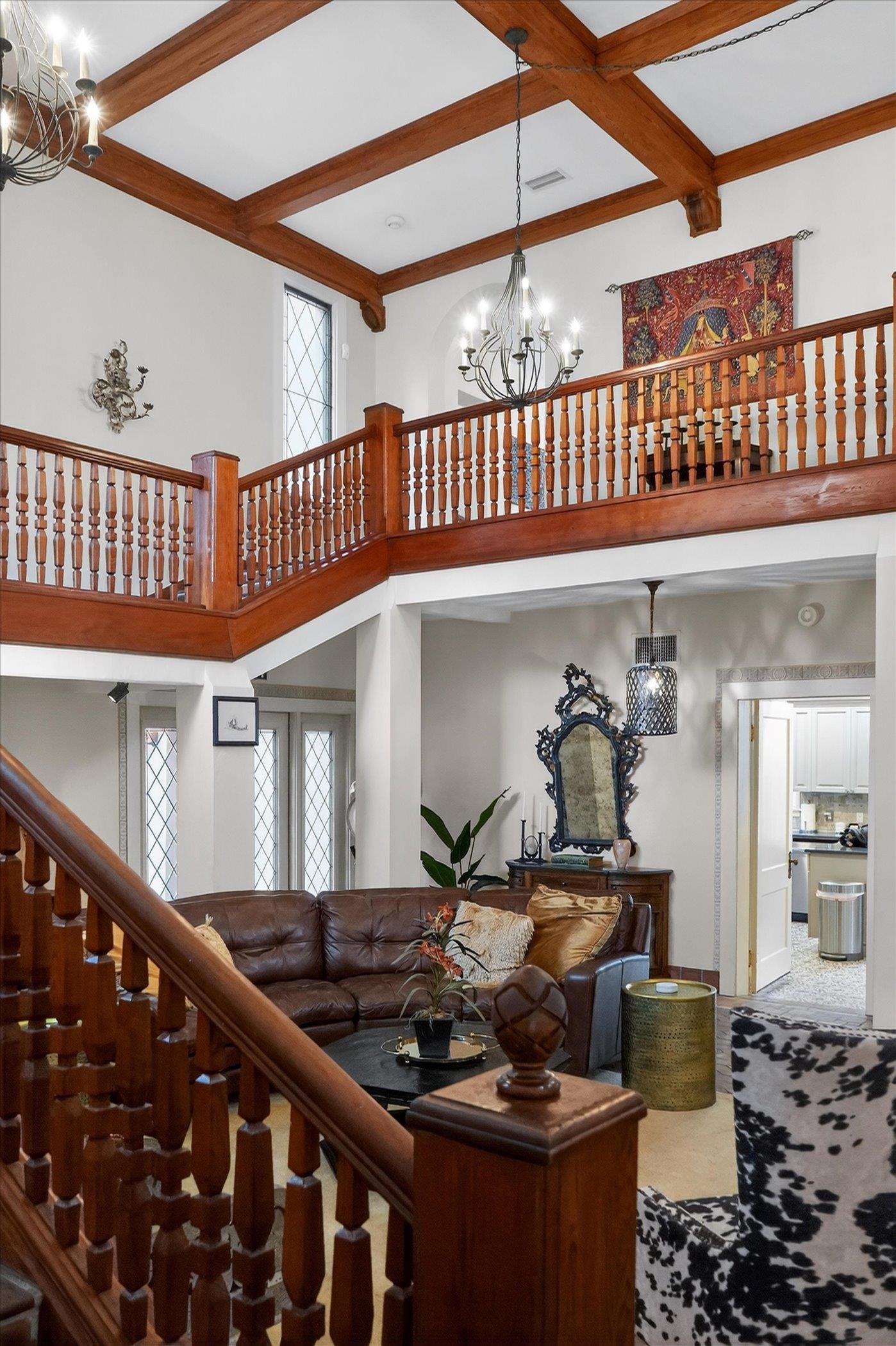 16 May Street St. Augustine, FL 32084 - Photo 17 of 85 Living room with suspended lighting and coffered ceiling