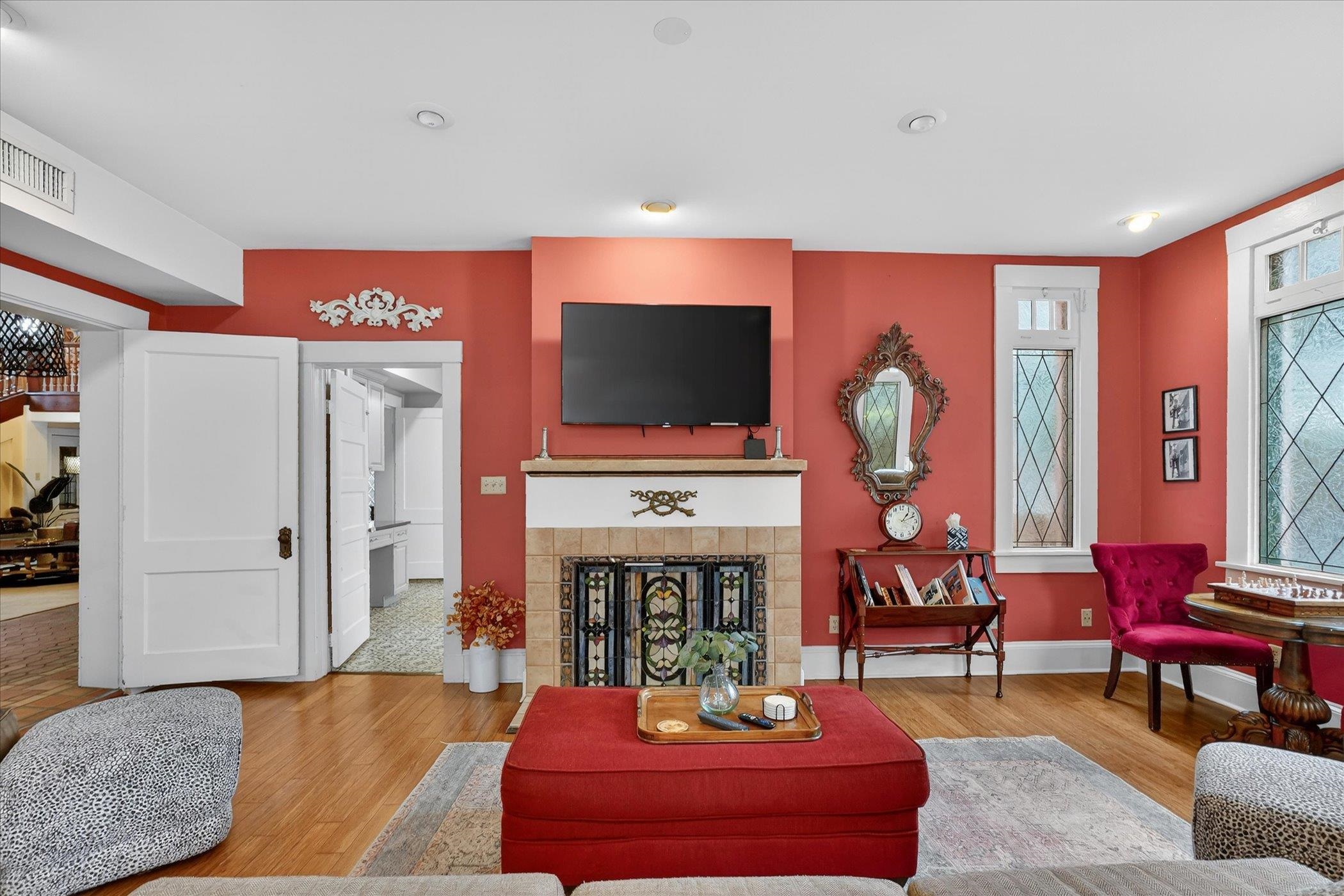 16 May Street St. Augustine, FL 32084 - Photo 24 of 85 Living room featuring a tiled fireplace and wood finished floors