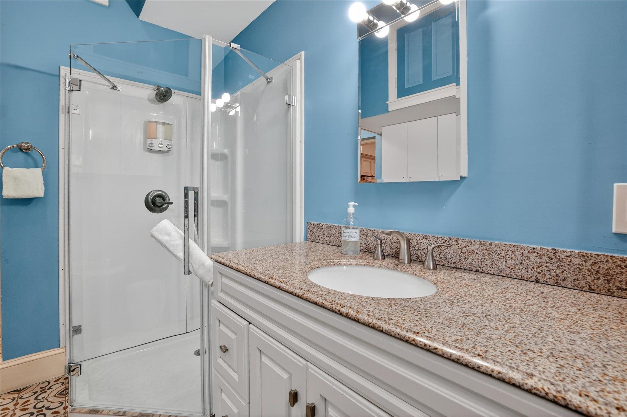 16 May Street St. Augustine, FL 32084 - Photo 37 of 85 Bathroom with vanity and a shower stall