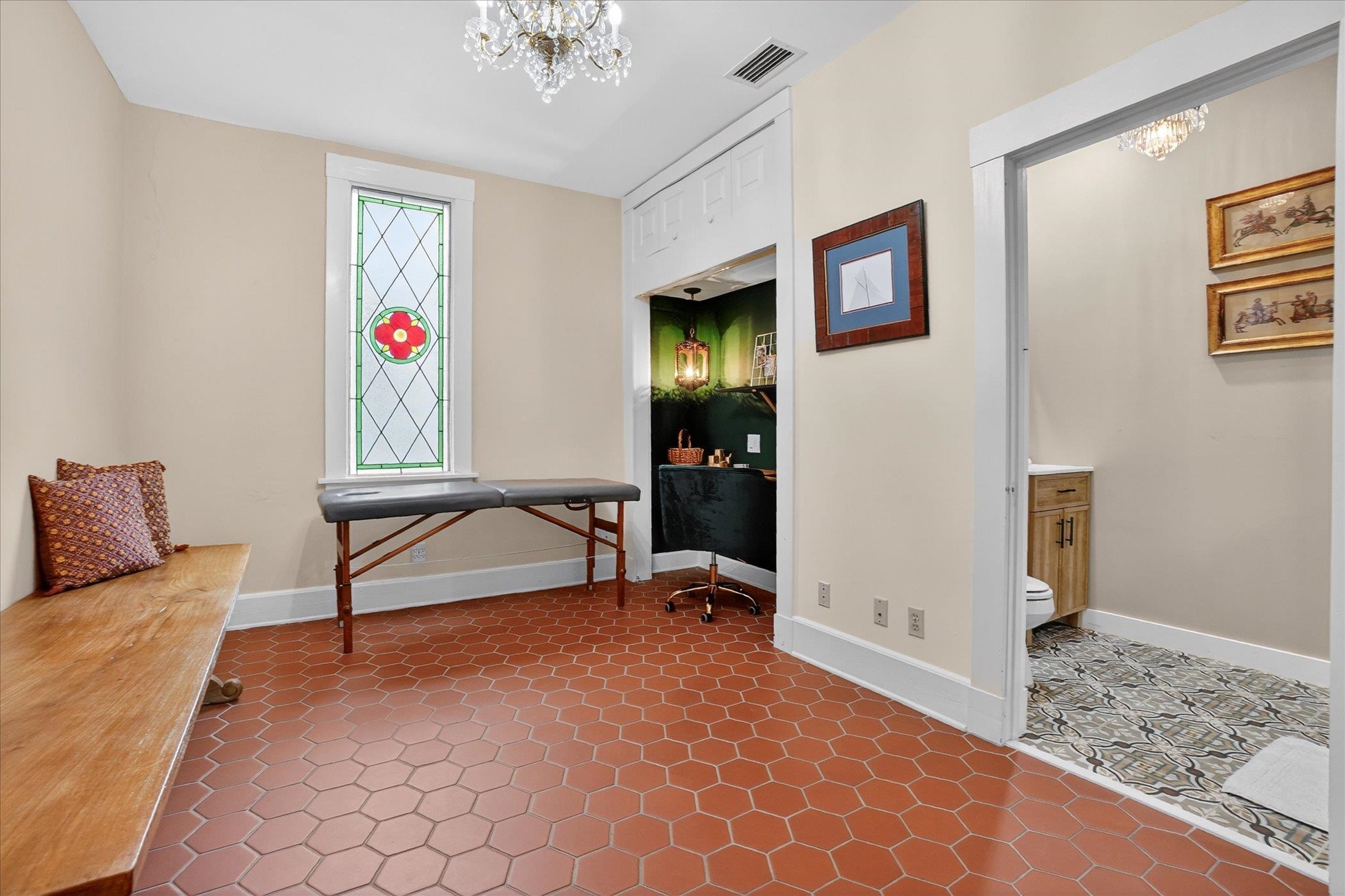 16 May Street St. Augustine, FL 32084 - Photo 52 of 85 Sitting room with hanging lights