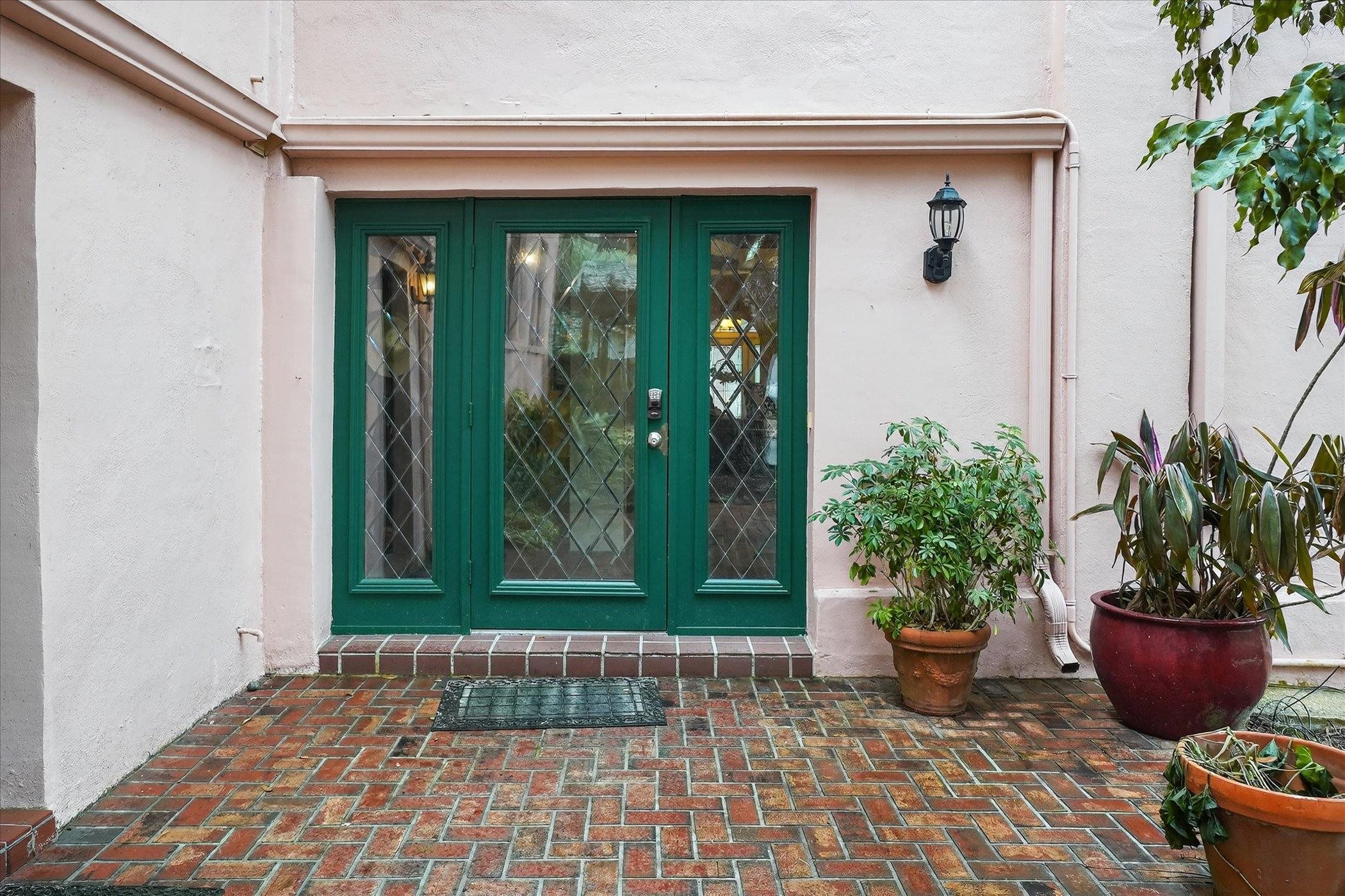 16 May Street St. Augustine, FL 32084 - Photo 60 of 85 Entrance to property featuring french doors and stucco siding