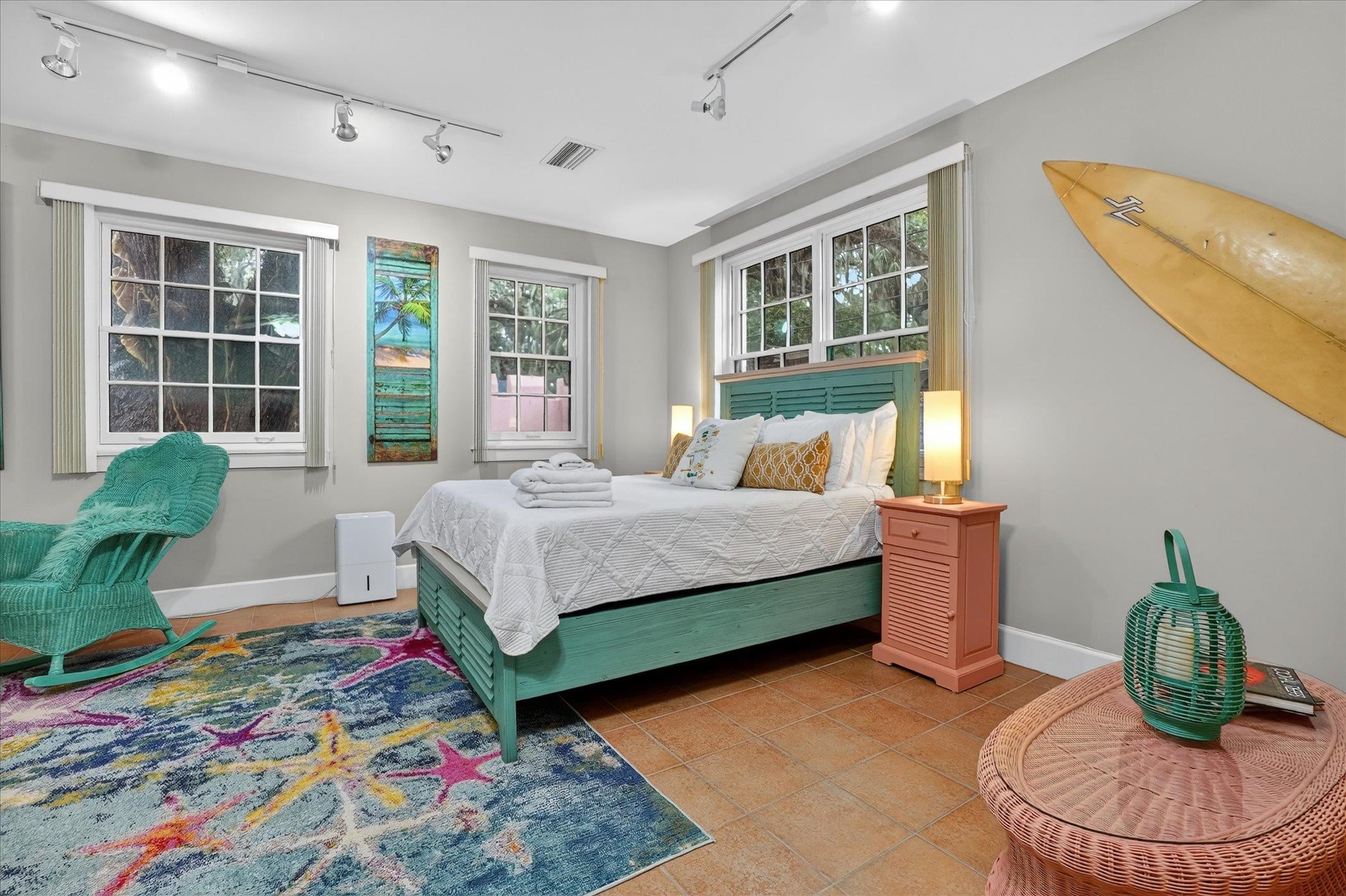 16 May Street St. Augustine, FL 32084 - Photo 8 of 85 Tiled bedroom with rail lighting