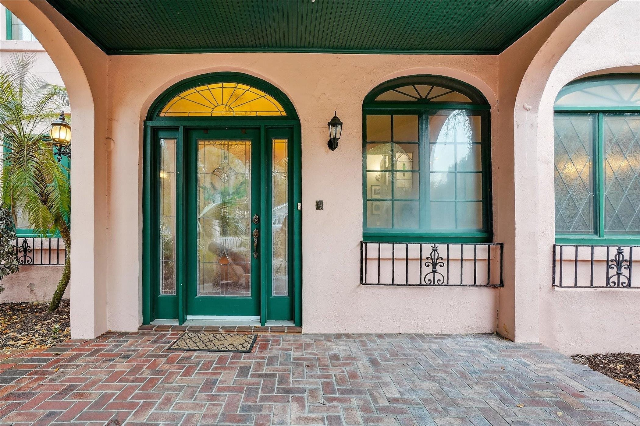 16 May Street St. Augustine, FL 32084 - Photo 8 of 85 Doorway to property with a porch and stucco siding
