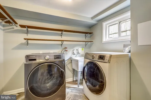 a utility room with dryer and washer