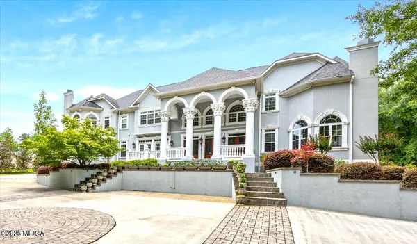 a front view of a house with porch