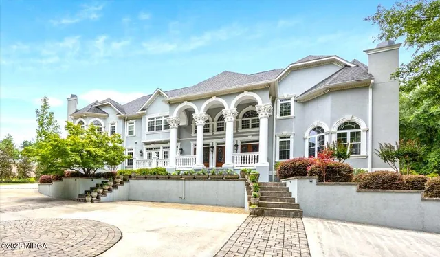 a front view of a house with porch