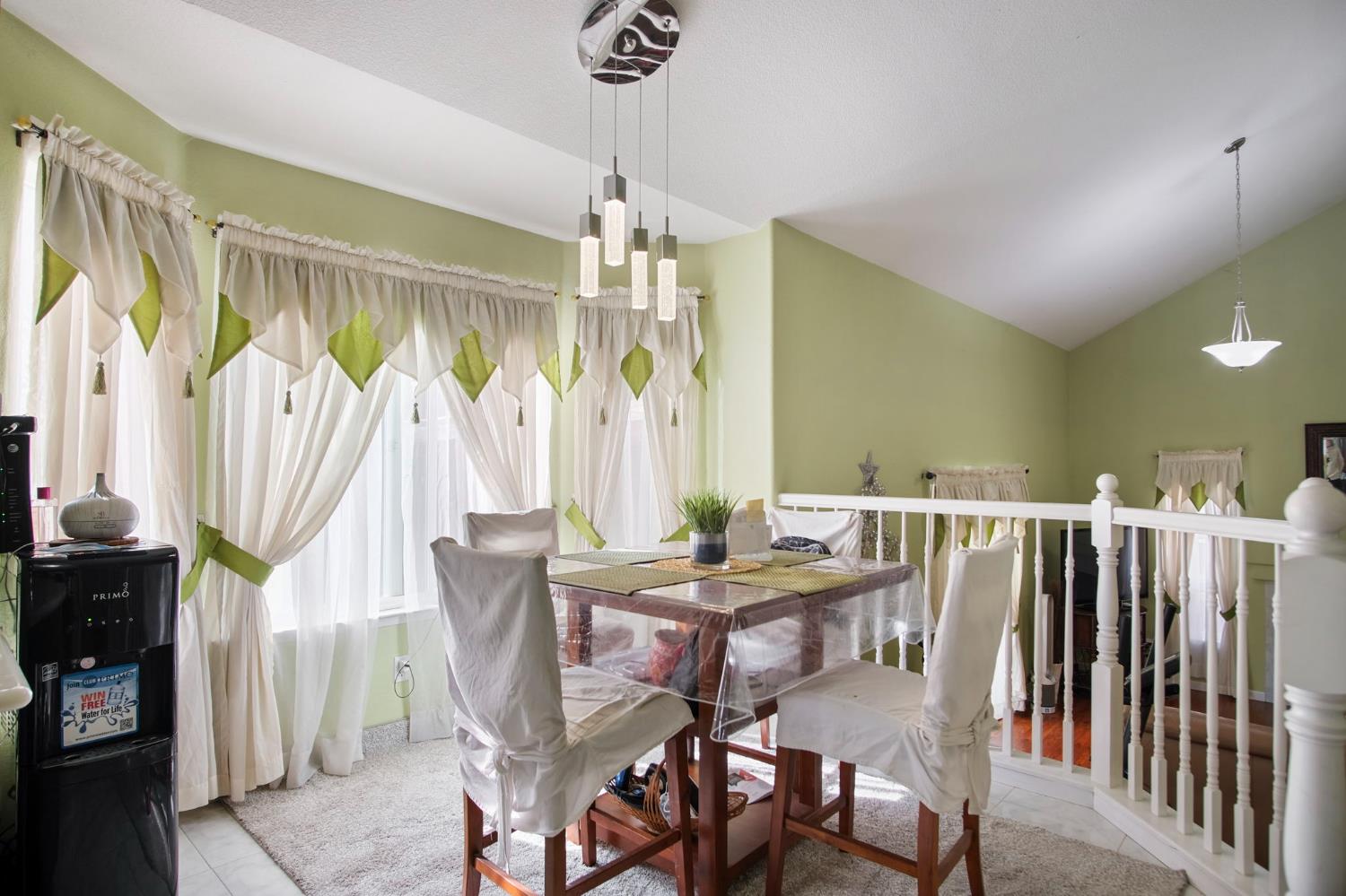 1568 Vía Del Pettoruto Gustine, CA 95322 - Photo 14 of 30 a dining room with furniture window entryway and wooden floor