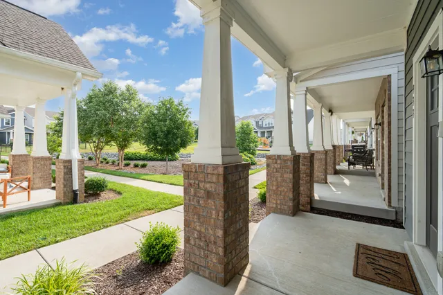 a view of living room with furniture and flat screen tv
