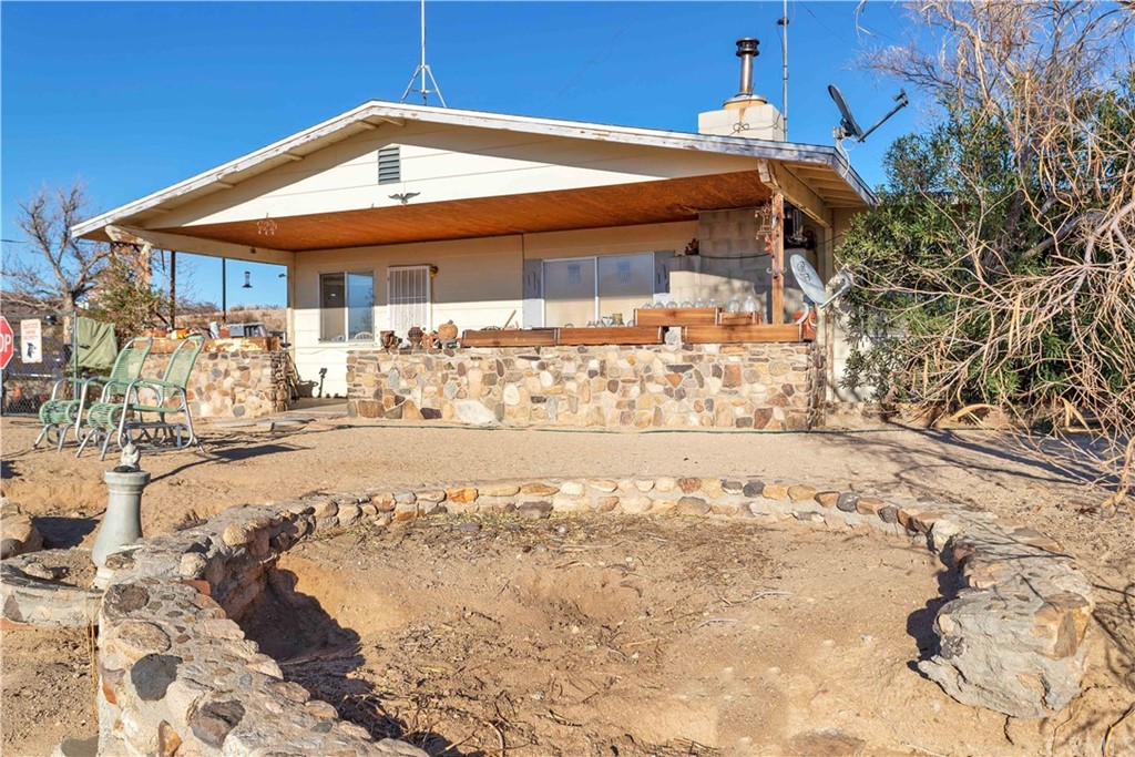 64303 Carot Road Joshua Tree, CA 92252 - Photo 1 of 1 a view of a house with a yard