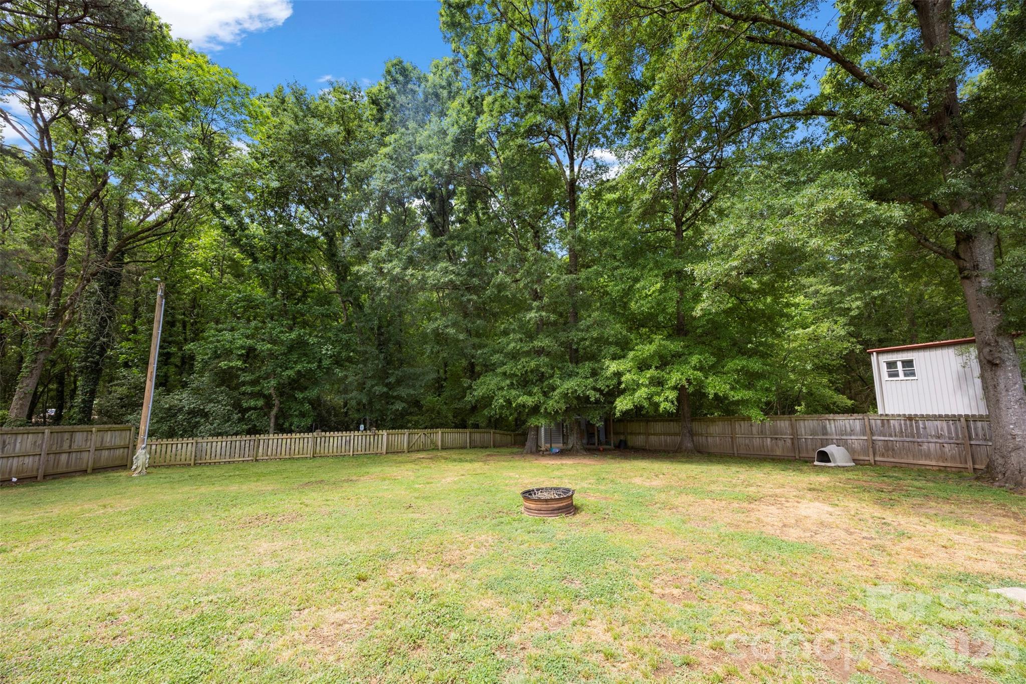 10919 Harrisburg Road Fort Mill, SC 29707 - Photo 28 of 43 a view of a swimming pool with an outdoor seating