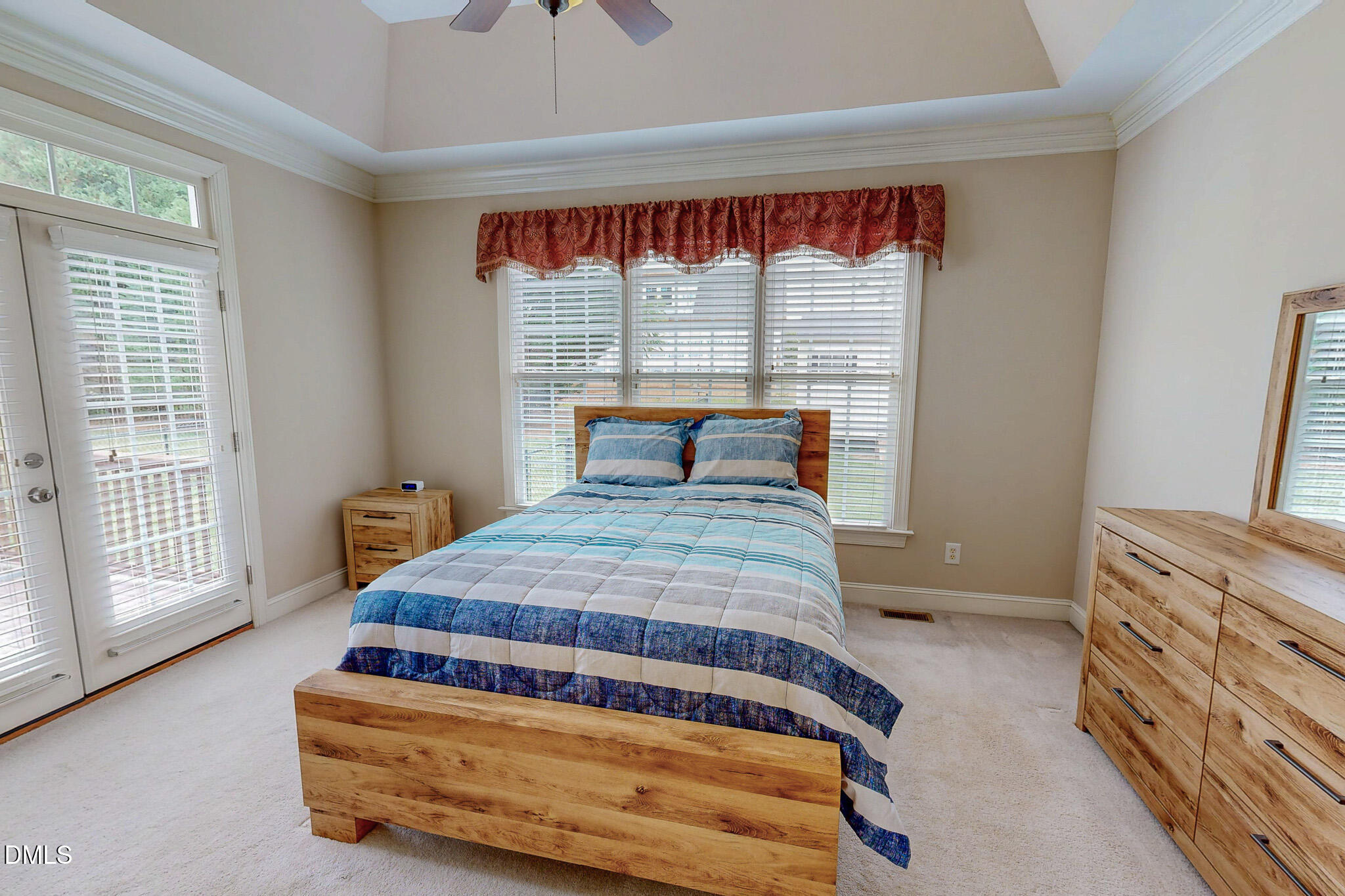 115 Duncan Plantation Road Timberlake, NC 27583 - Photo 13 of 48 a bedroom with a bed and window