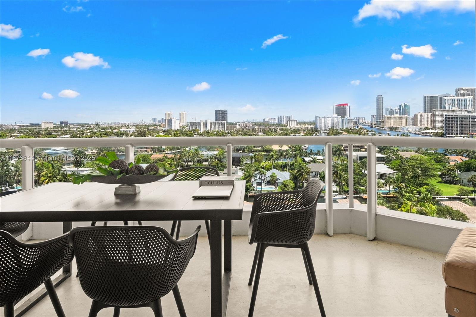 21200 Point Place, Unit 1102 Aventura, FL 33180 - Photo 31 of 41 a view of a chairs and table in patio
