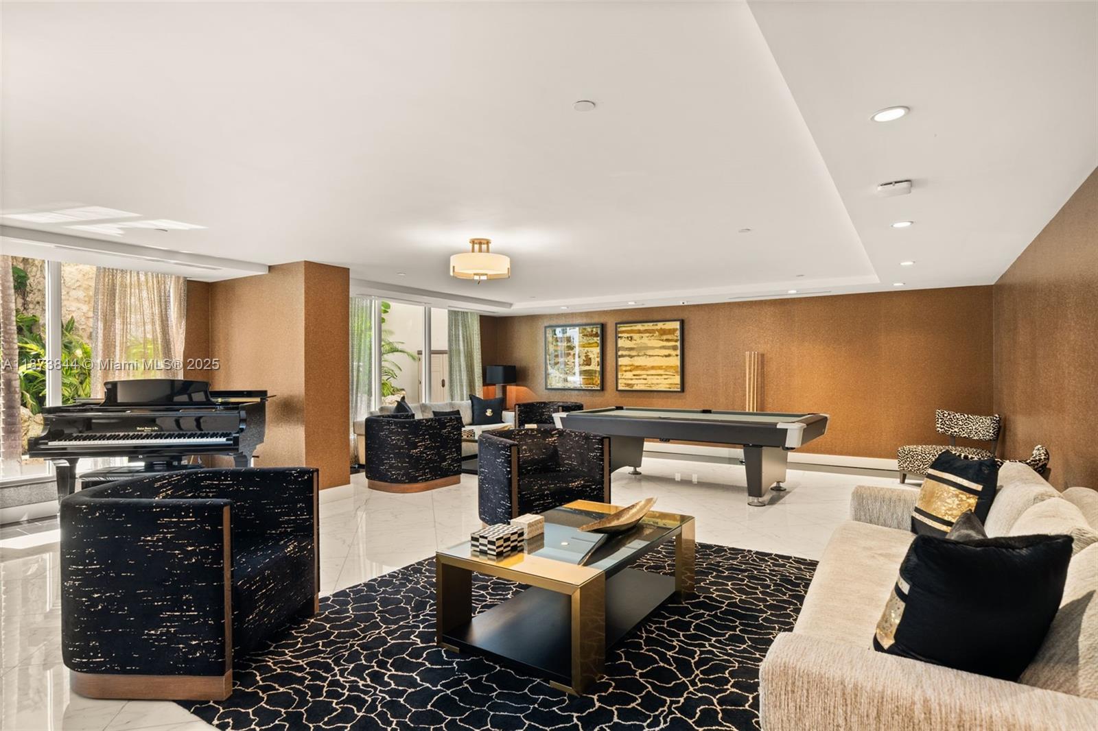 21200 Point Place, Unit 1102 Aventura, FL 33180 - Photo 35 of 41 a living room with furniture and a couch