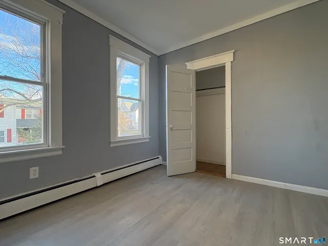 an empty room with windows