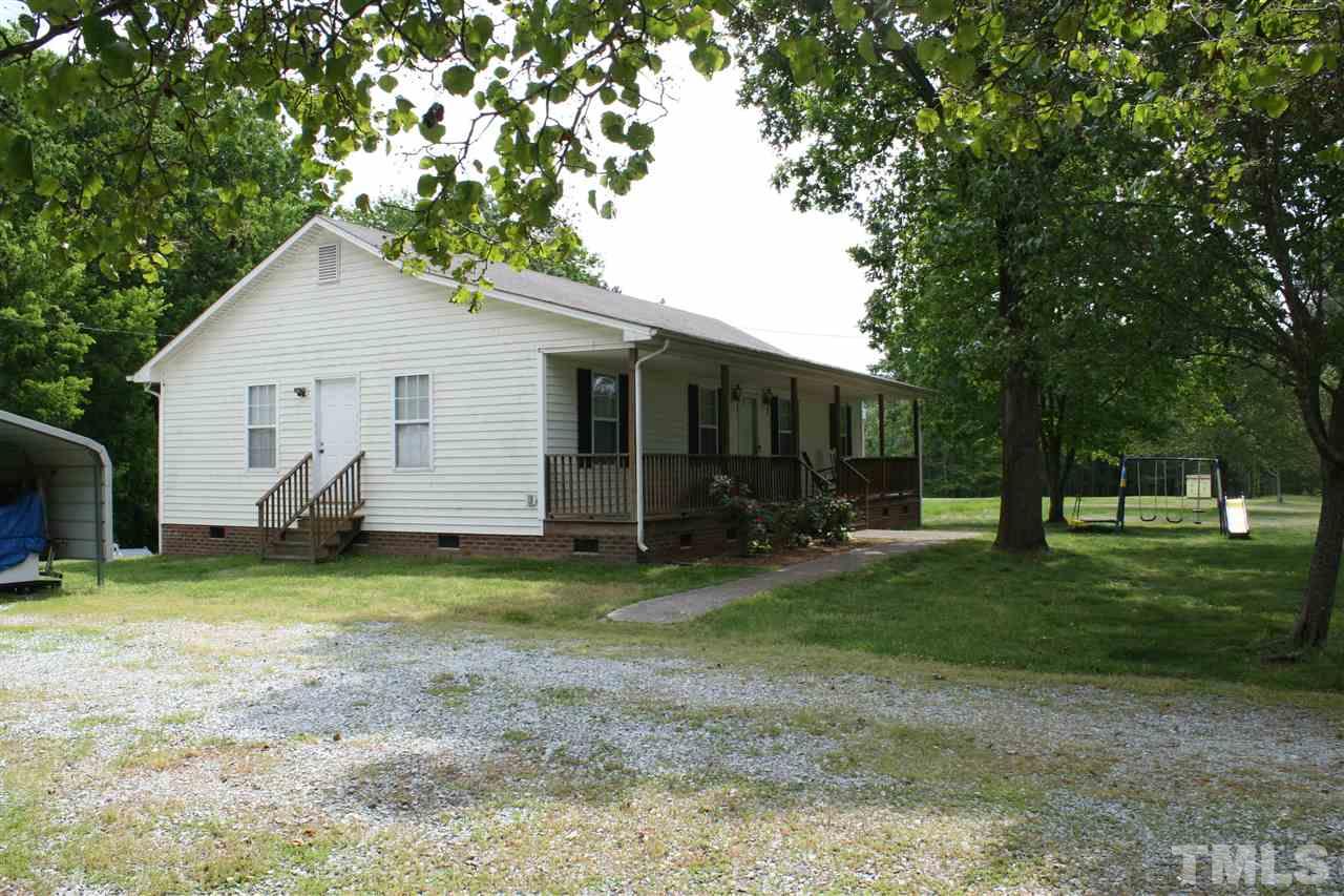 2817 Baptist Road Durham, NC 27703 - Photo 3 of 6 a view of a house with backyard