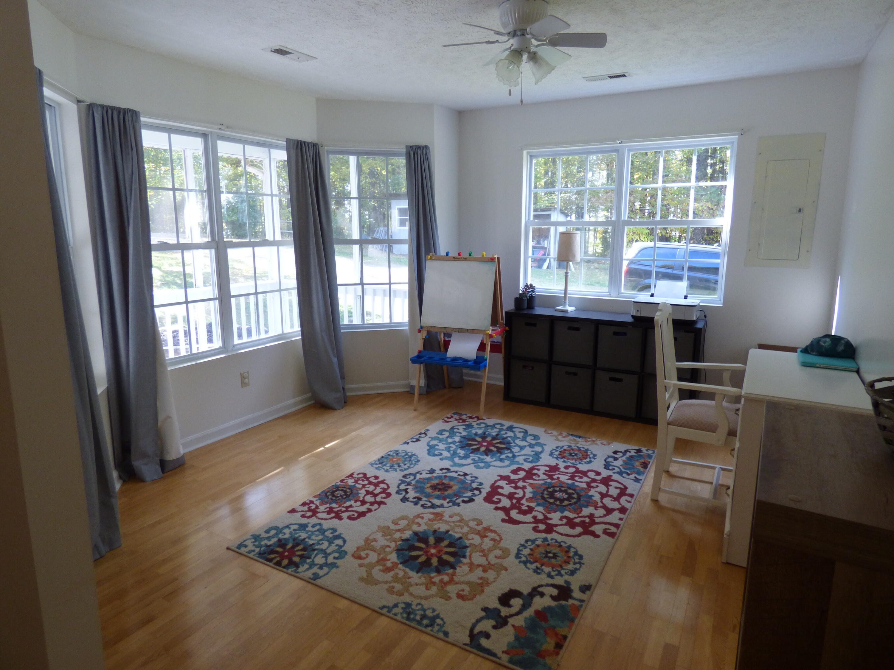 110 Little Cabin Road Northeast Floyd, VA 24091 - Photo 18 of 32 a room with furniture window and wooden floor