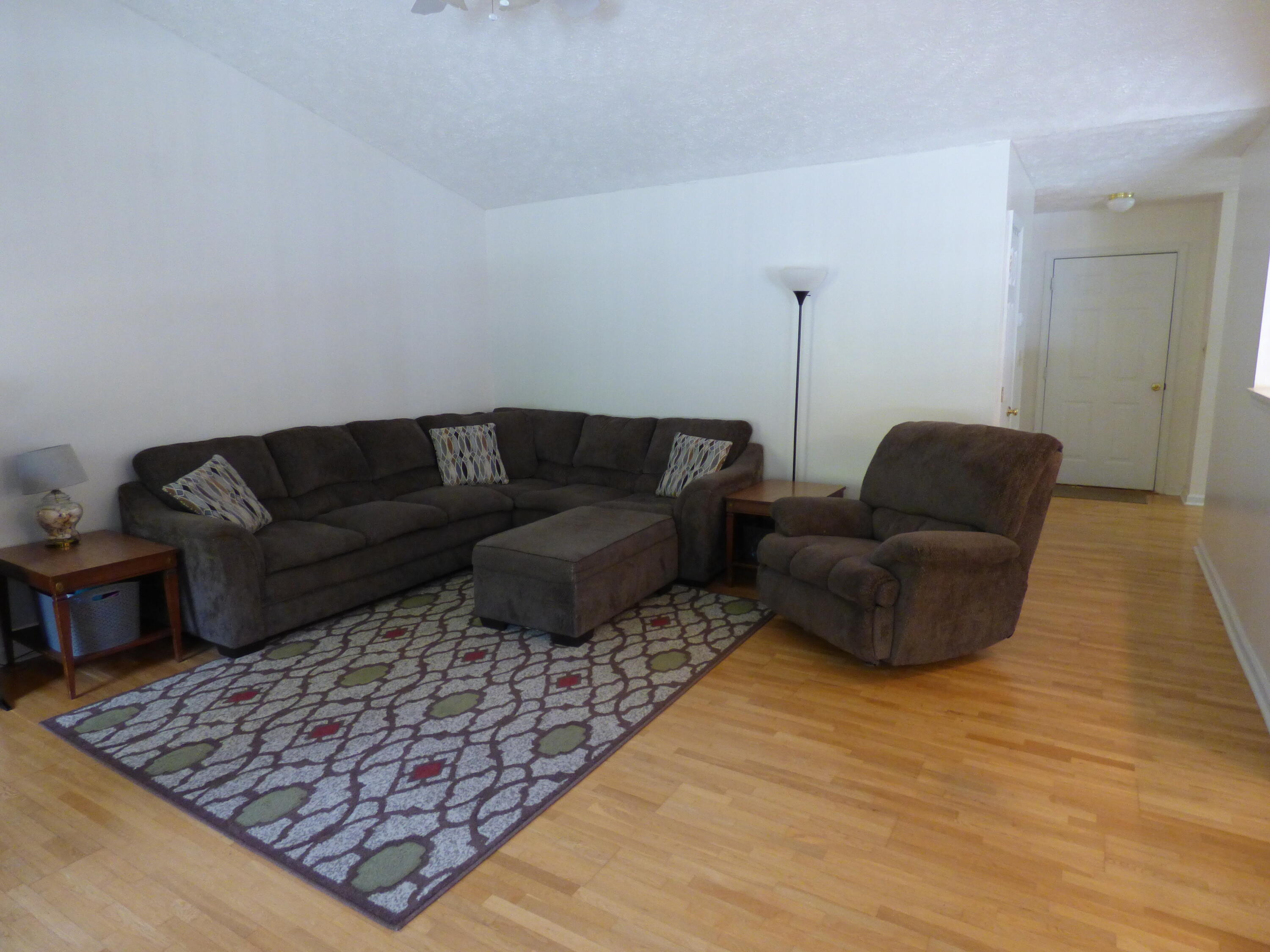 110 Little Cabin Road Northeast Floyd, VA 24091 - Photo 26 of 32 a living room with furniture and a rug