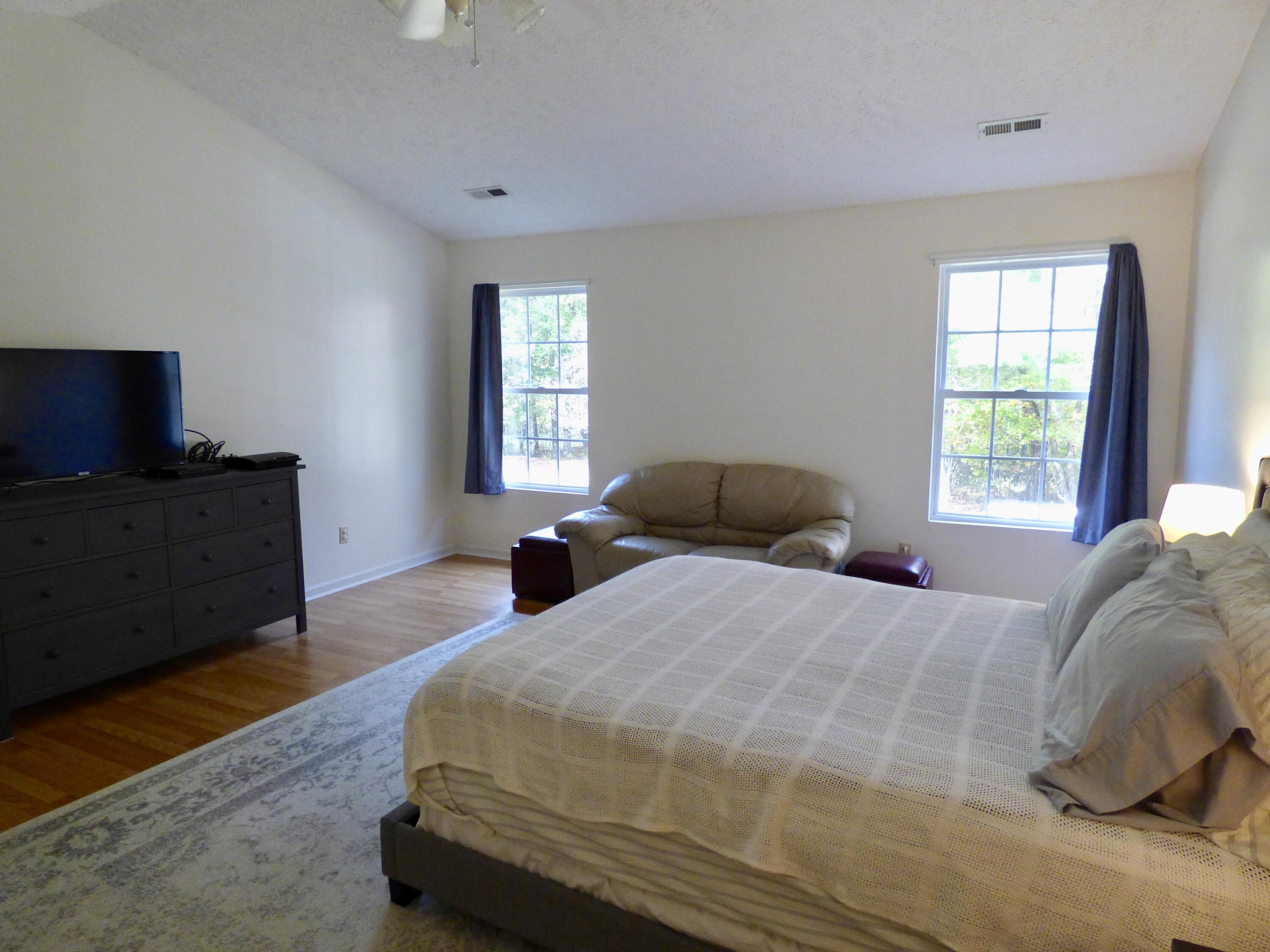 110 Little Cabin Road Northeast Floyd, VA 24091 - Photo 28 of 32 a bedroom with a bed and window
