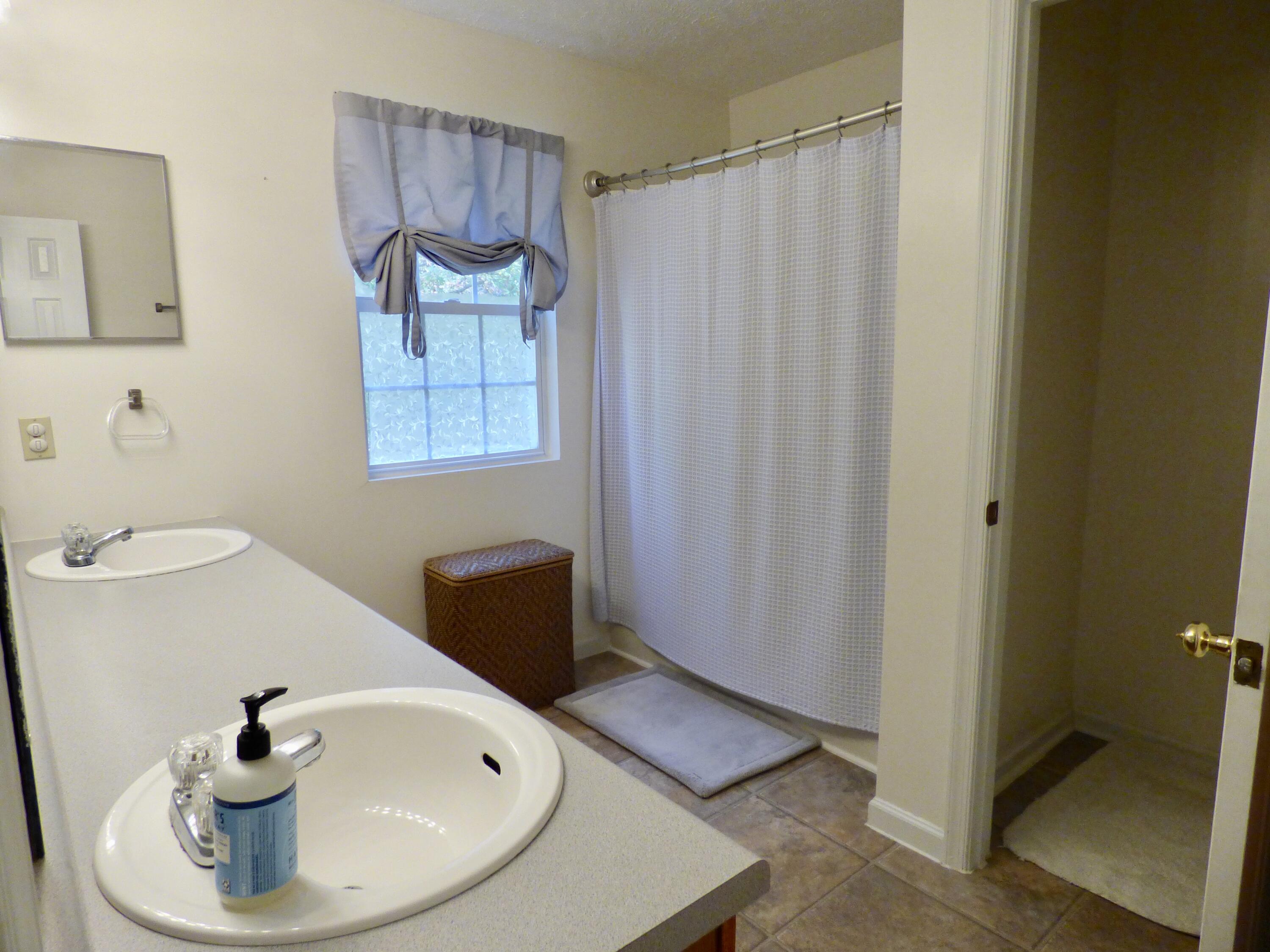 110 Little Cabin Road Northeast Floyd, VA 24091 - Photo 29 of 32 a bathroom with a sink and a tub