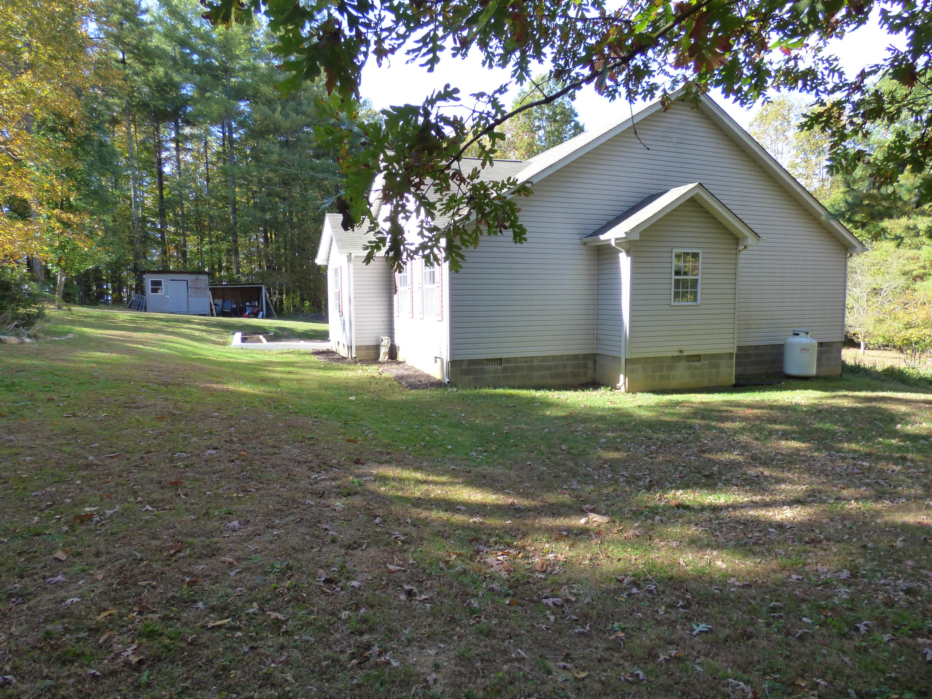 110 Little Cabin Road Northeast Floyd, VA 24091 - Photo 4 of 32 a view of a house with a yard