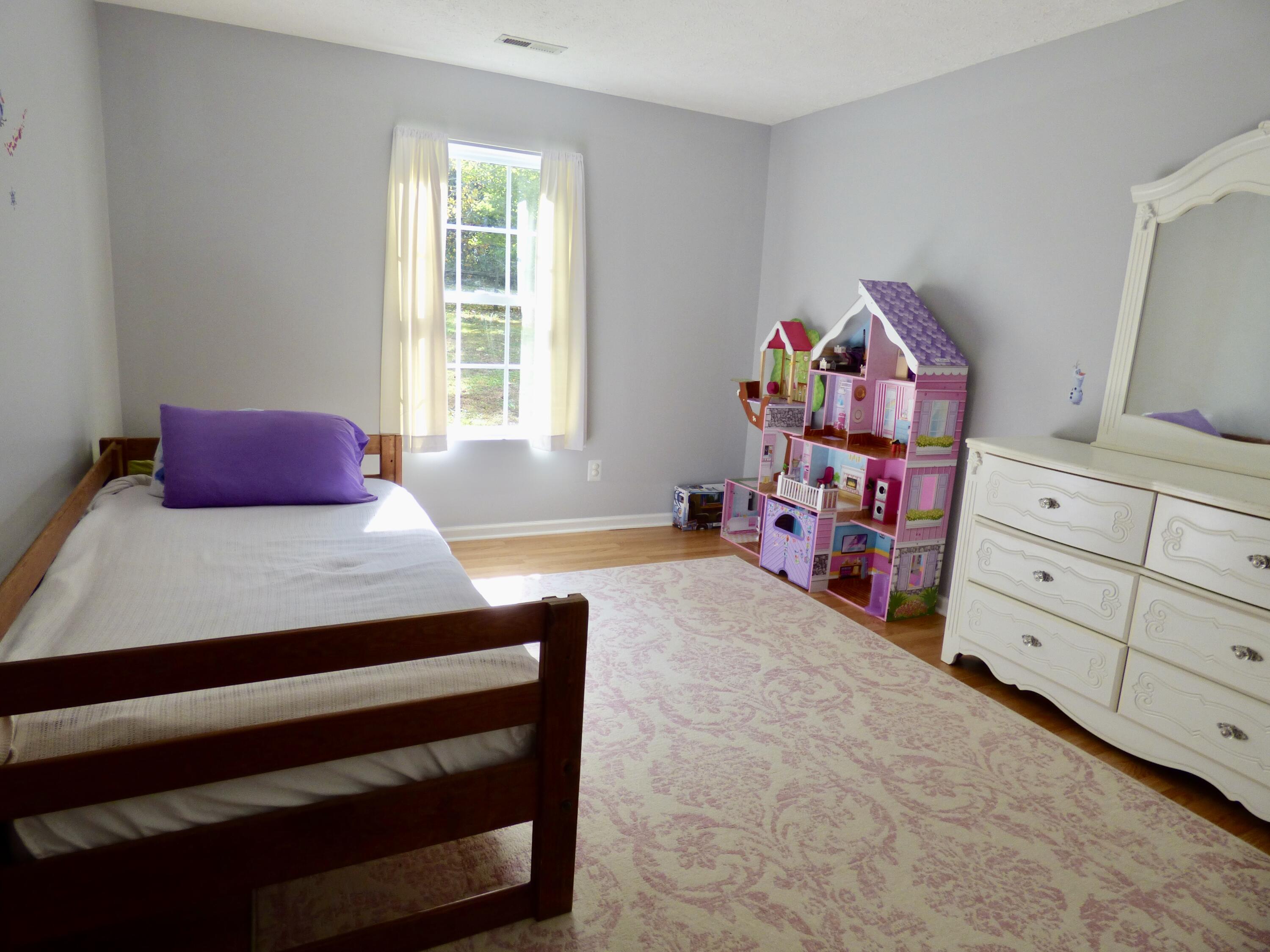 110 Little Cabin Road Northeast Floyd, VA 24091 - Photo 31 of 32 a bedroom with a bed and a dresser in it