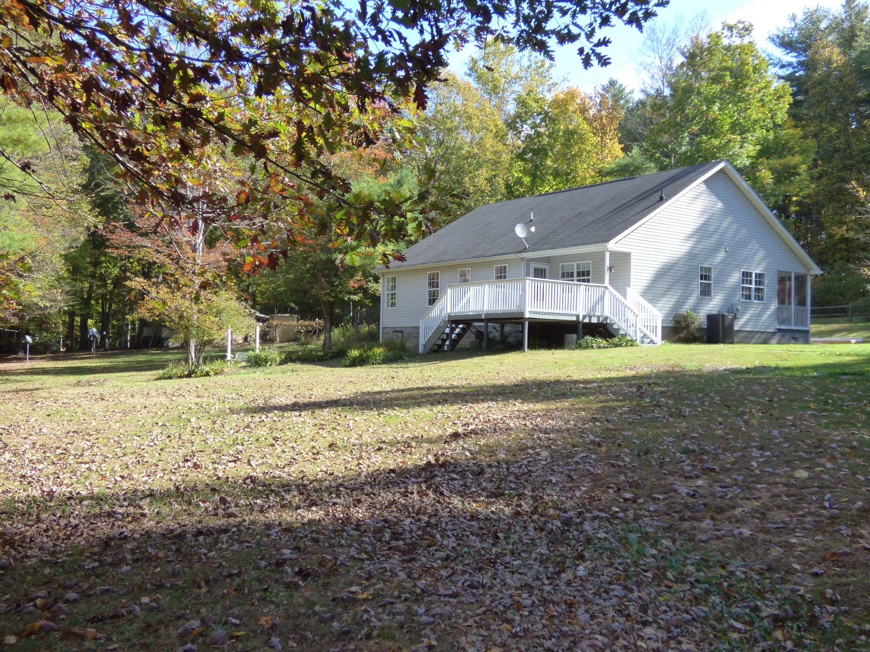 110 Little Cabin Road Northeast Floyd, VA 24091 - Photo 6 of 32 a view of house with a garden