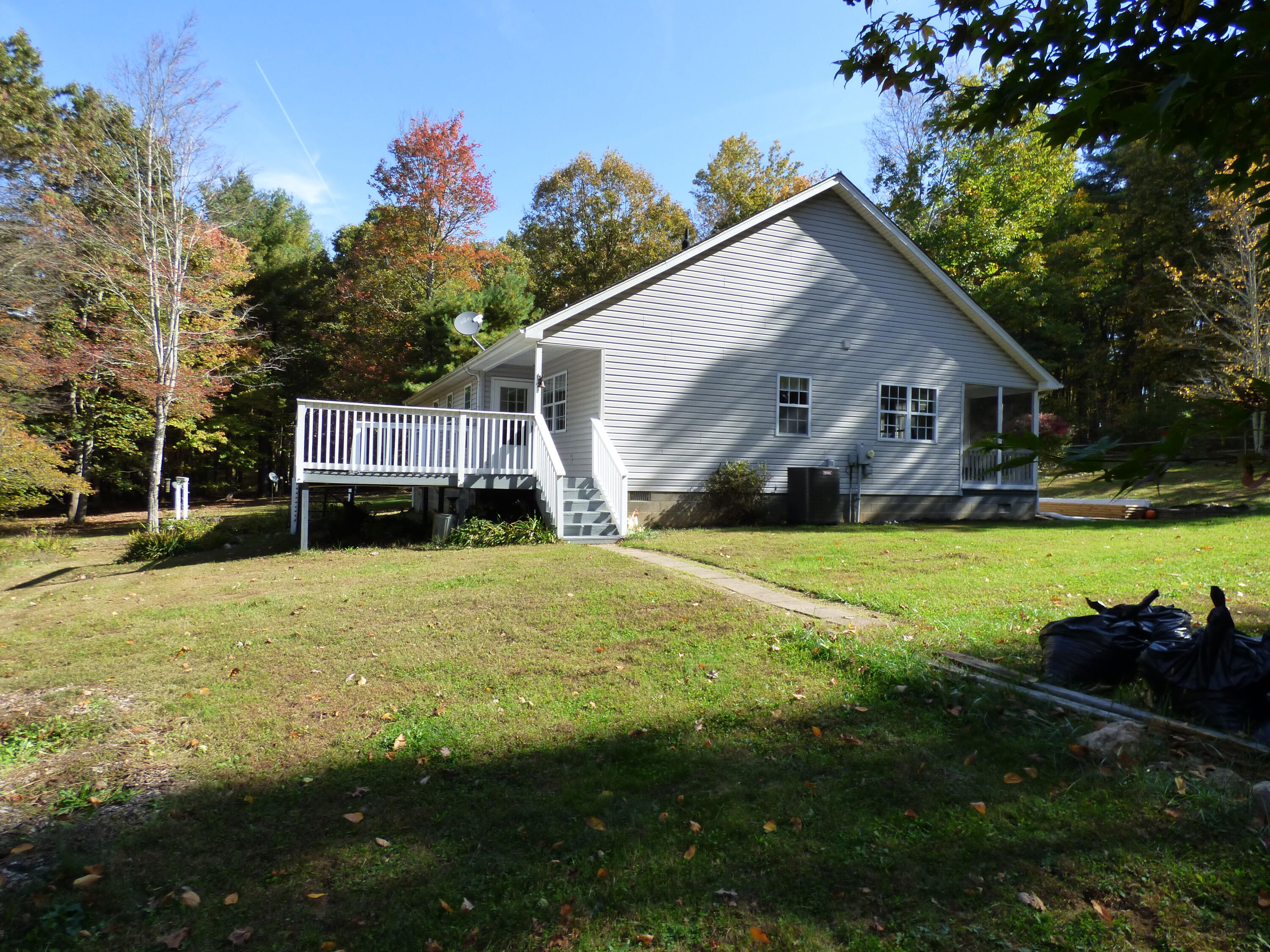 110 Little Cabin Road Northeast Floyd, VA 24091 - Photo 7 of 32 a view of a house with a yard