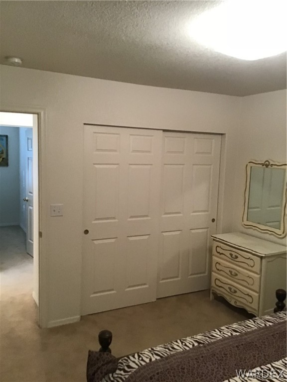 2204 Jamie Road Fort Mohave, AZ 86426 - Photo 16 of 22 a view of a room with racks on the wall